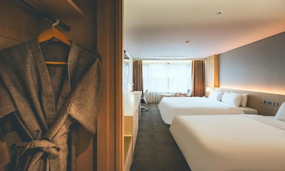 Bed in Wonju City Hotel HYEOKSIN