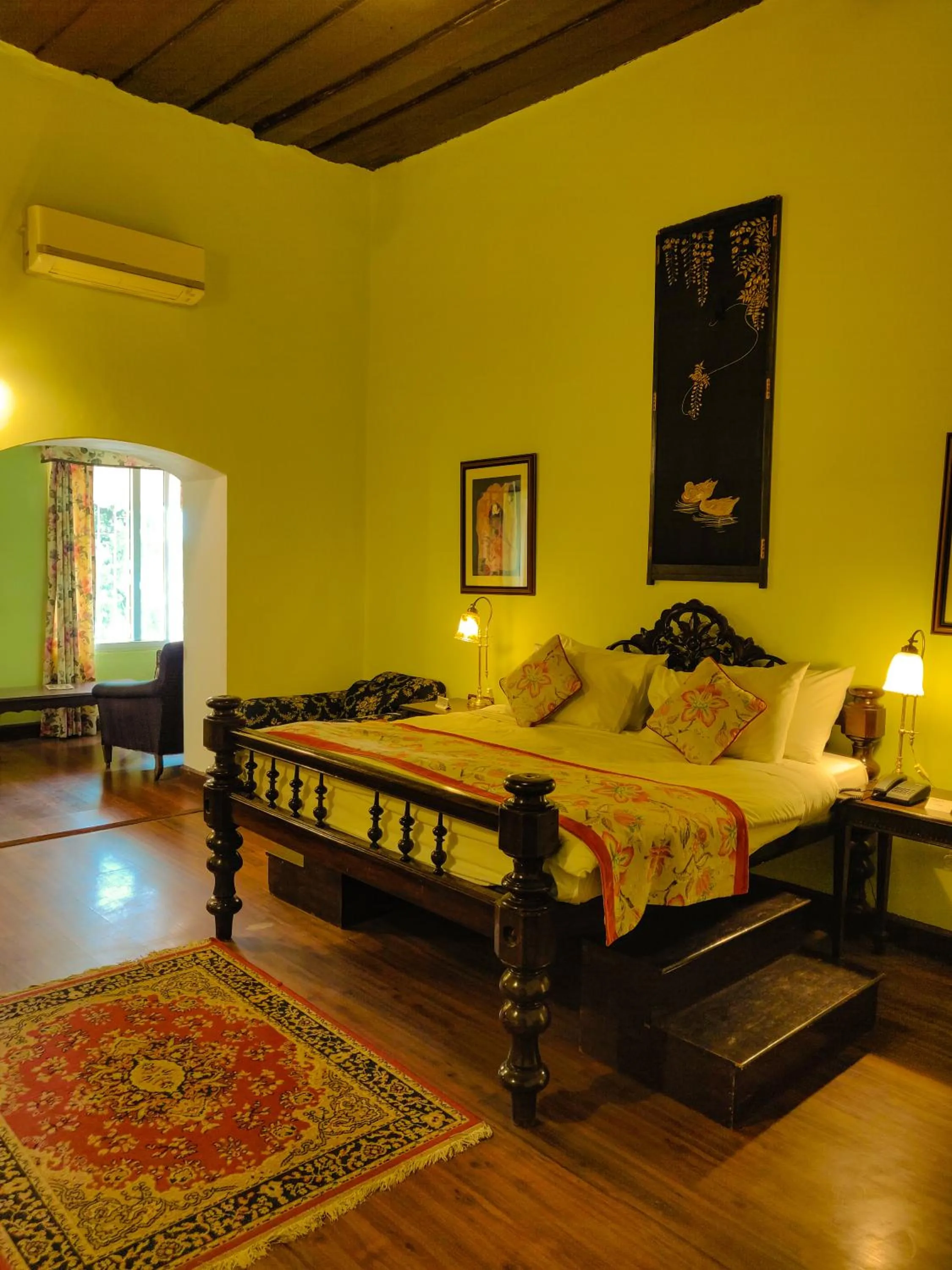 Bed in WelcomHeritage Kasmanda Palace