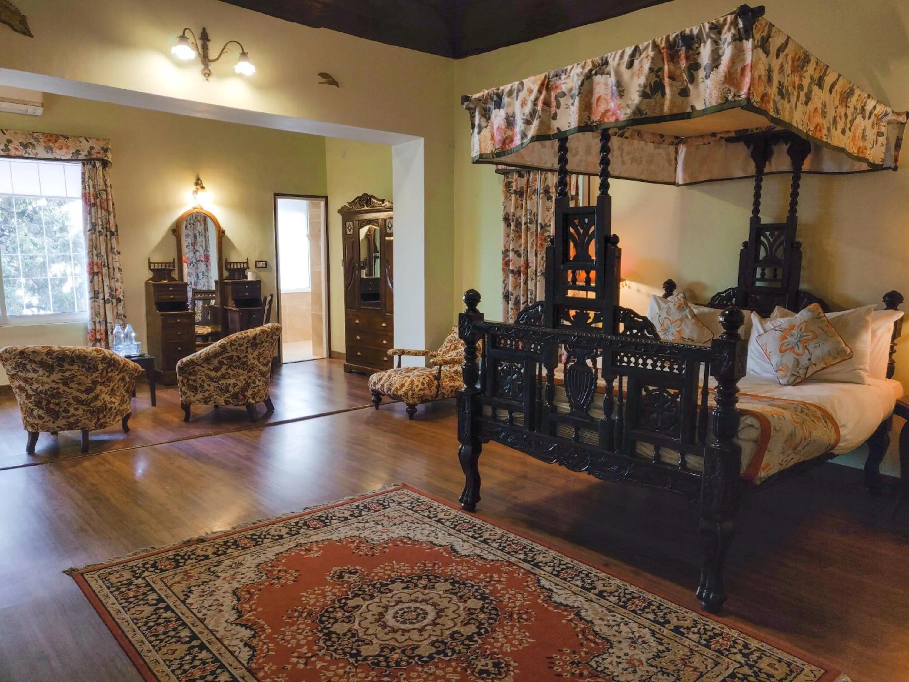 Bed in WelcomHeritage Kasmanda Palace