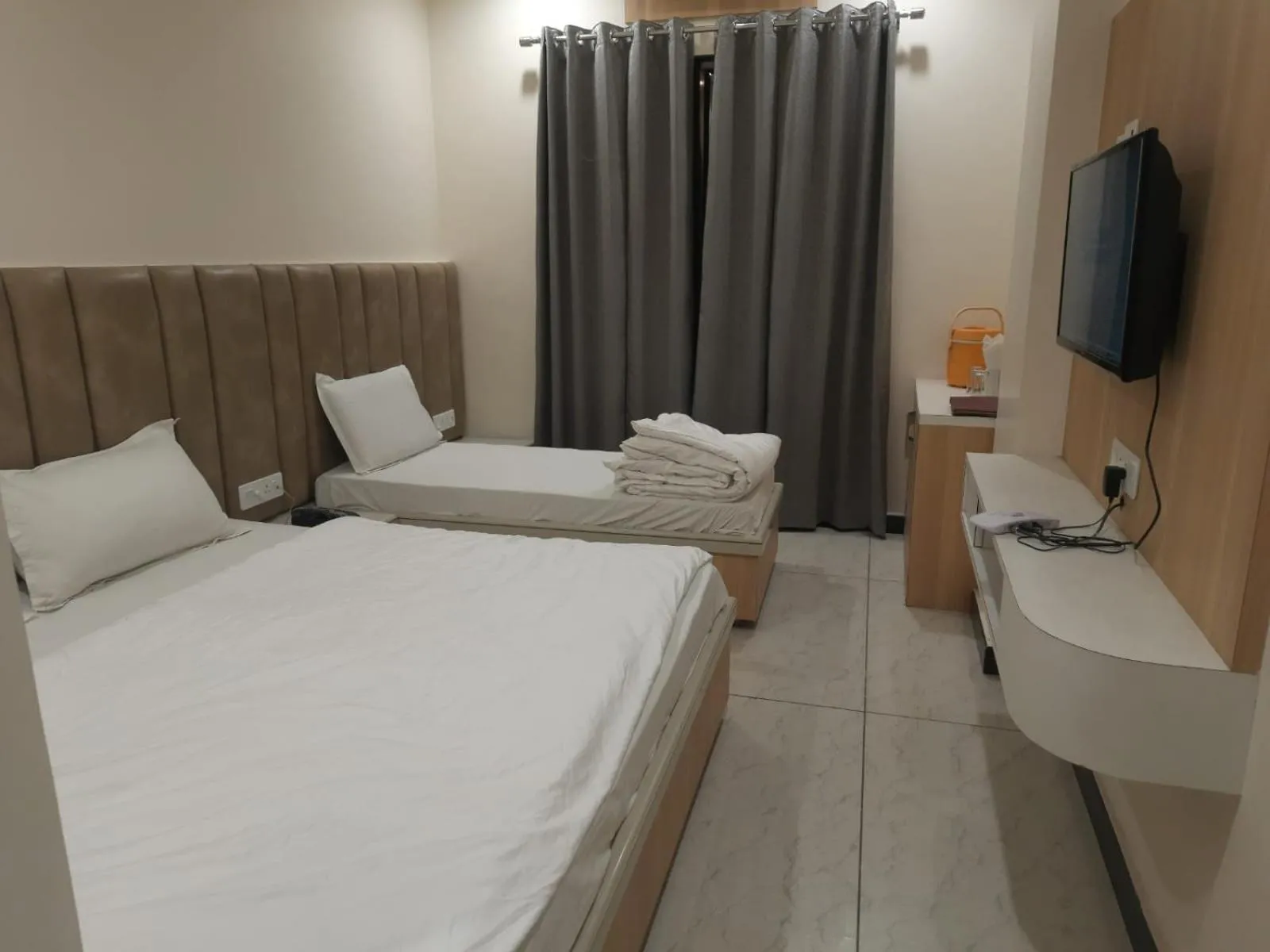 Bed in Hotel Jai Palace