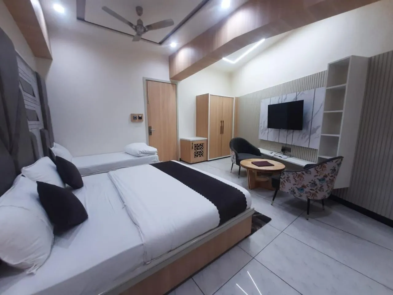 Bed in Hotel Jai Palace