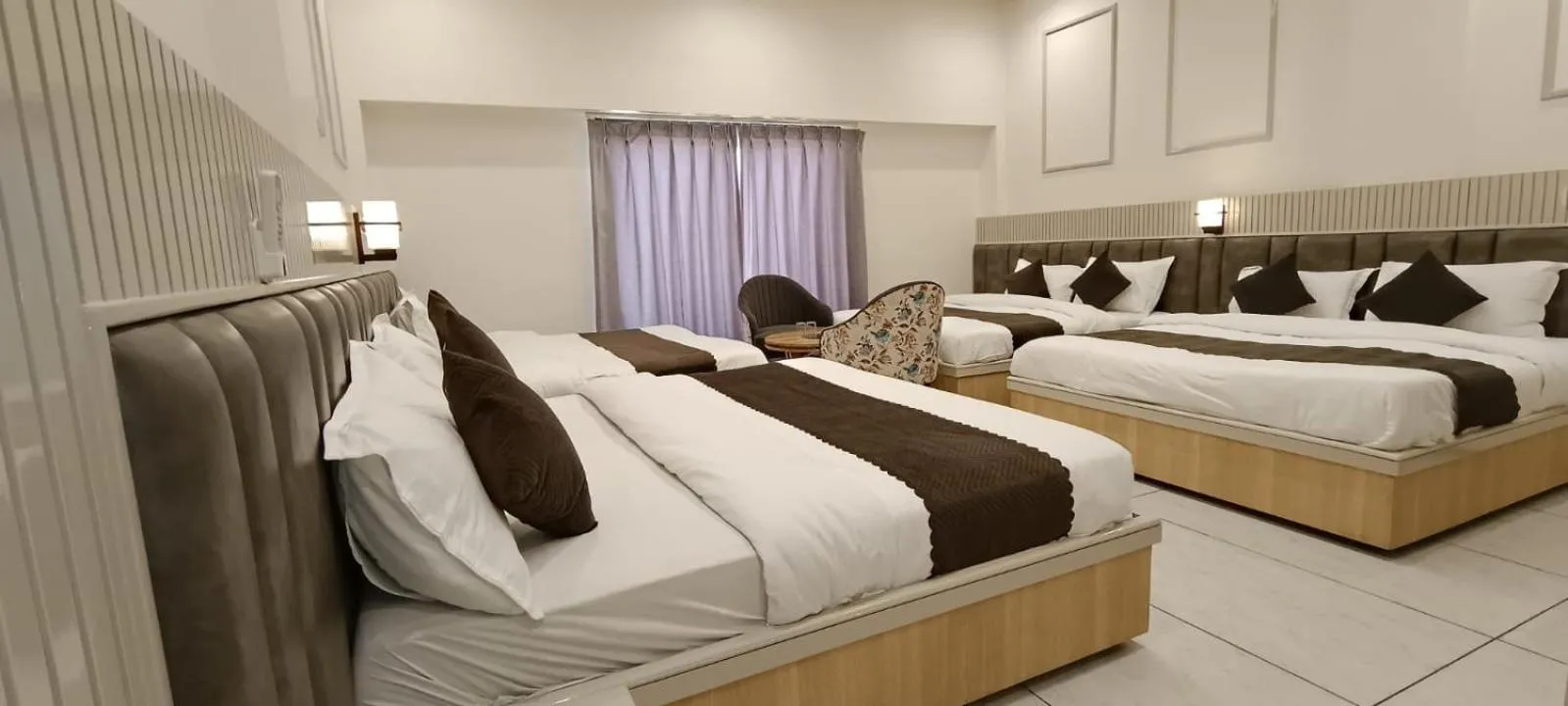 Bed in Hotel Jai Palace