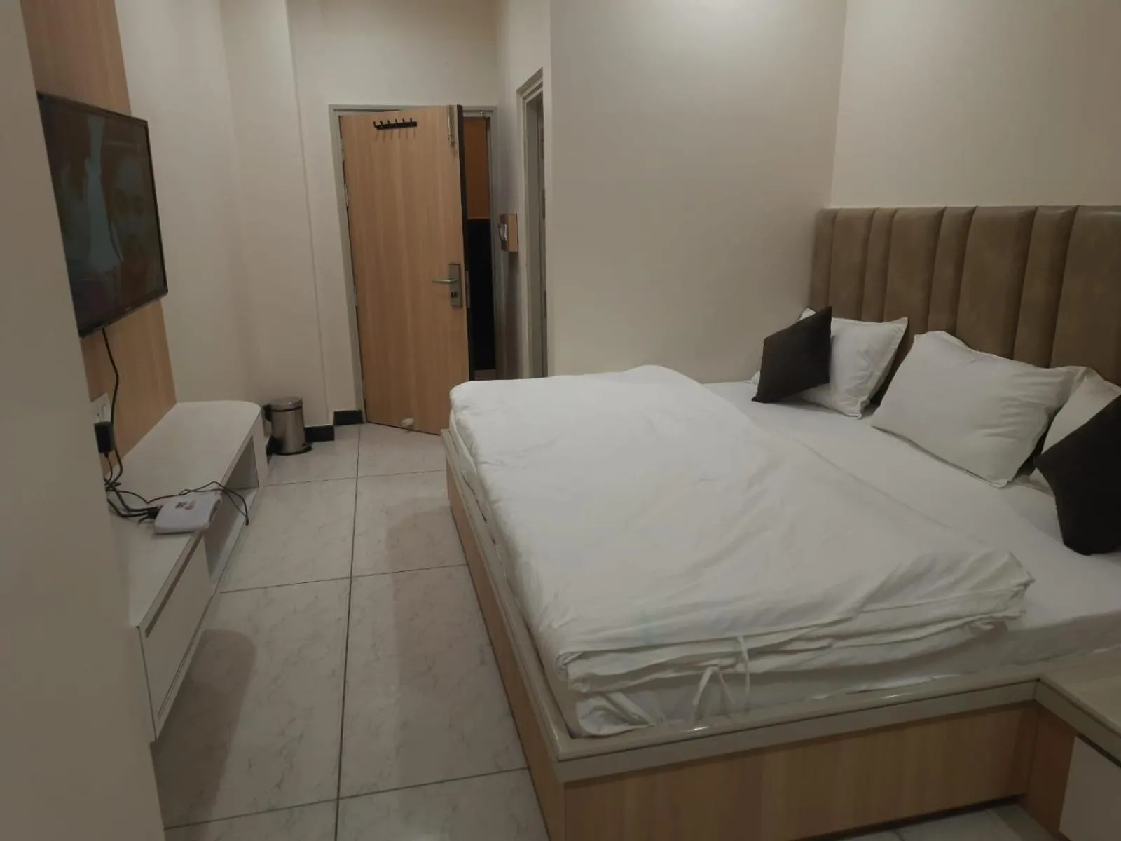 Bed in Hotel Jai Palace