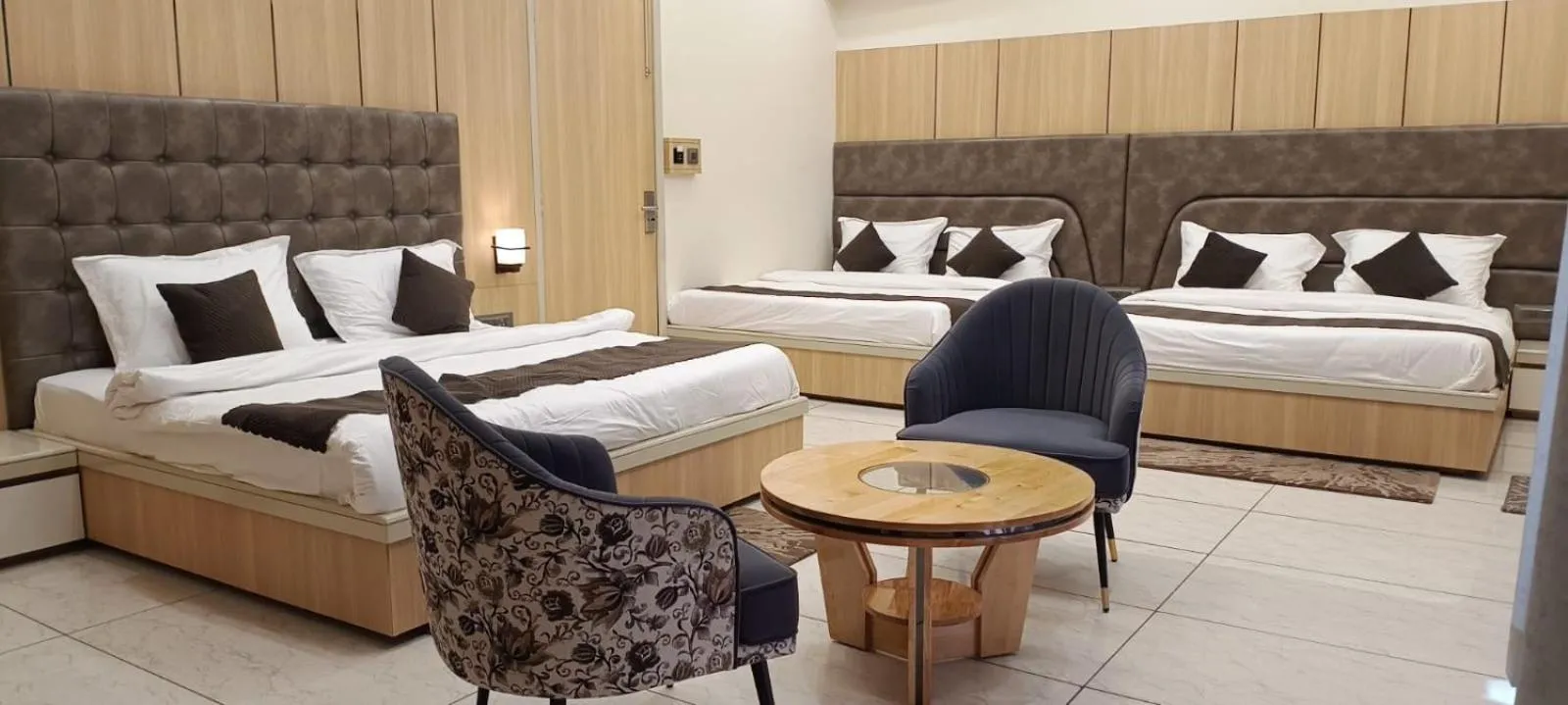 Bed in Hotel Jai Palace