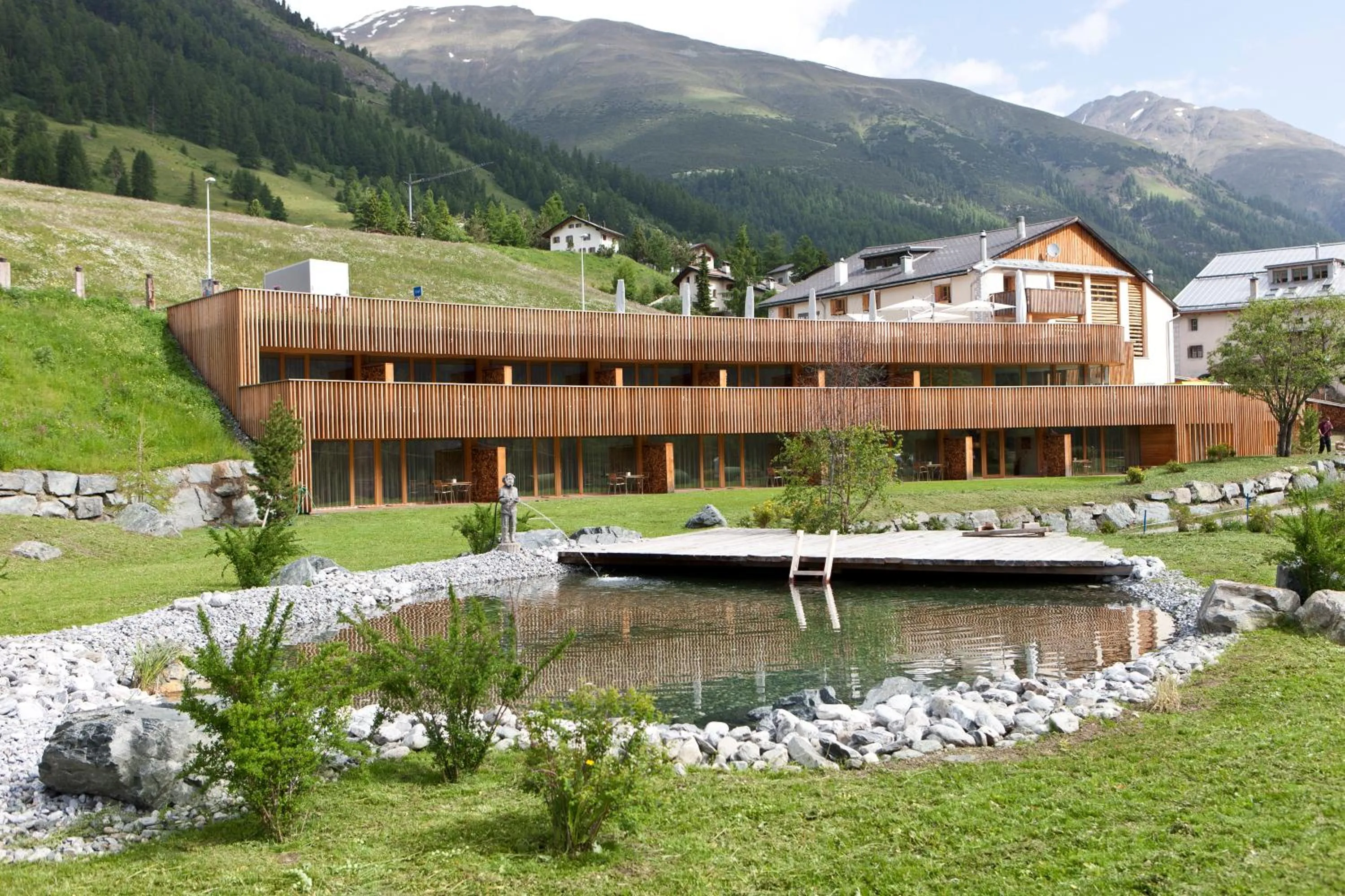 Property building in Relais & Châteaux IN LAIN Hotel Cadonau