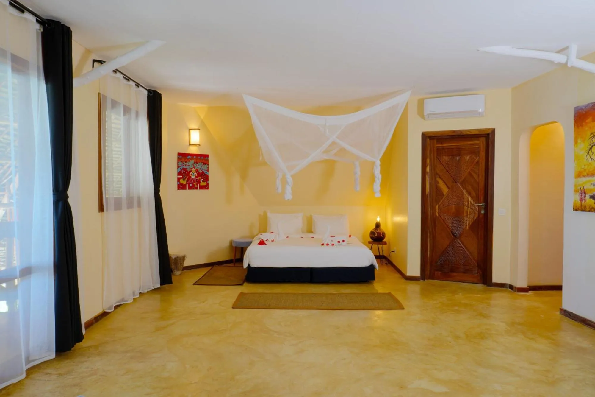 Bed in Zanziblue Boutique Villas