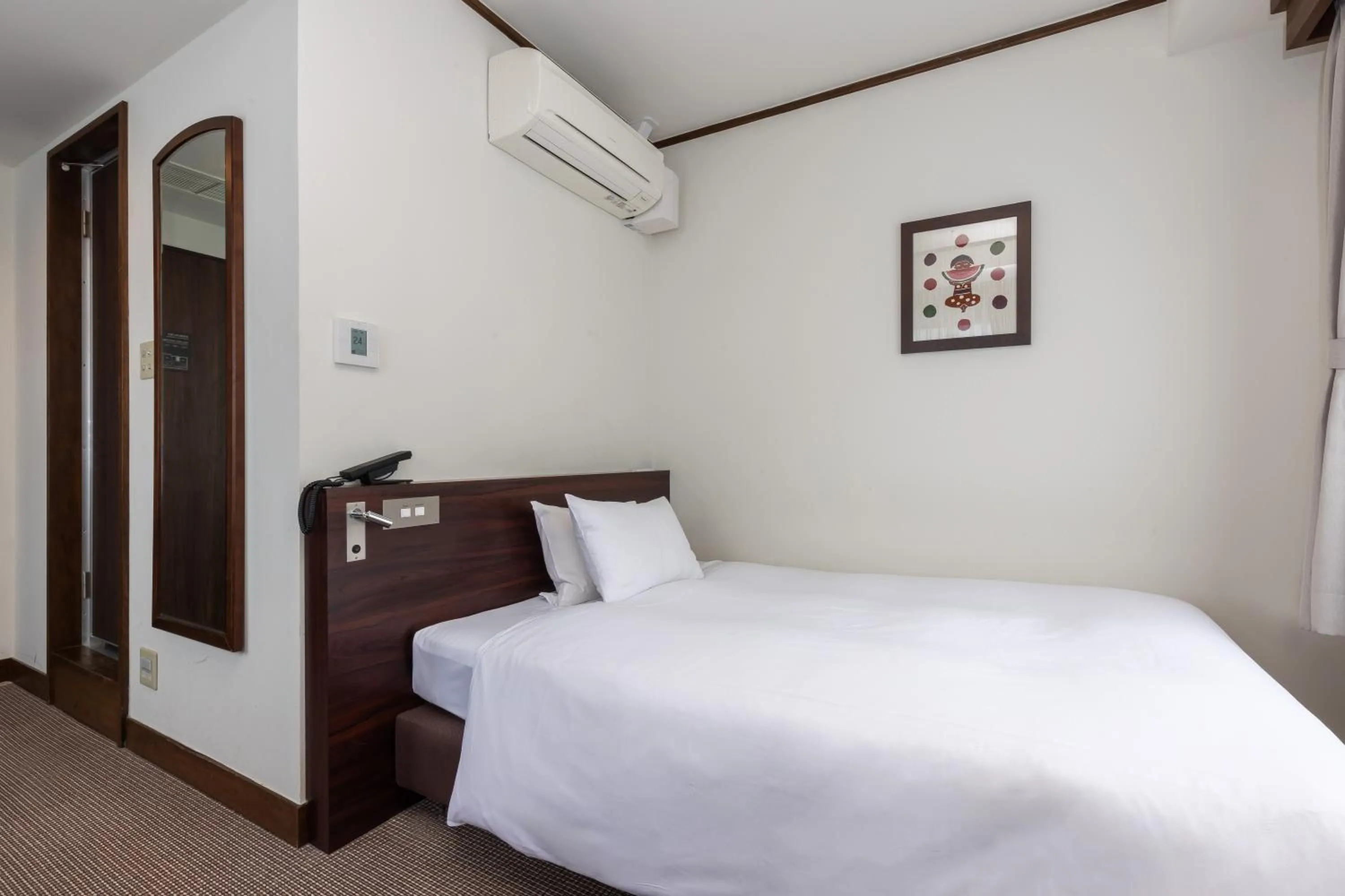 Bed in Matsumoto Hotel Kagetsu