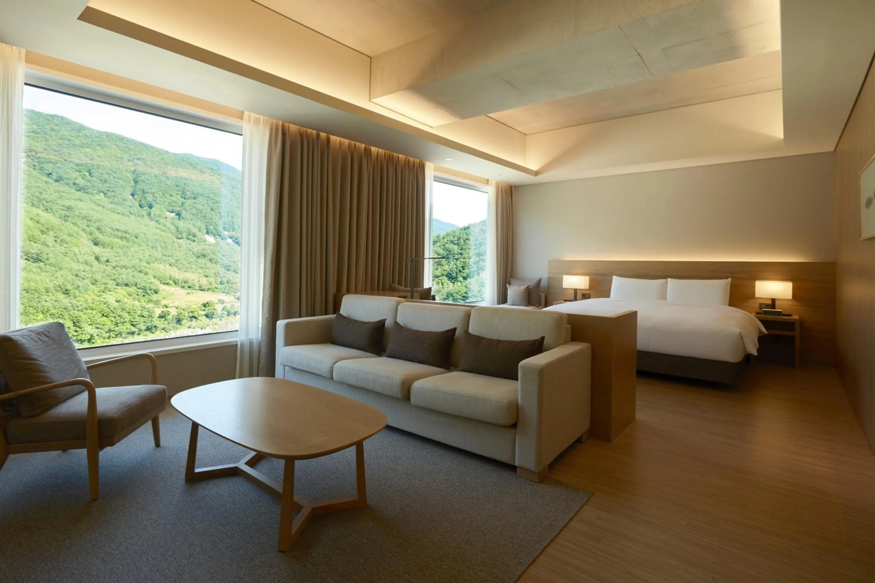 Living room, Bed in PARK ROCHE Resort & Wellness