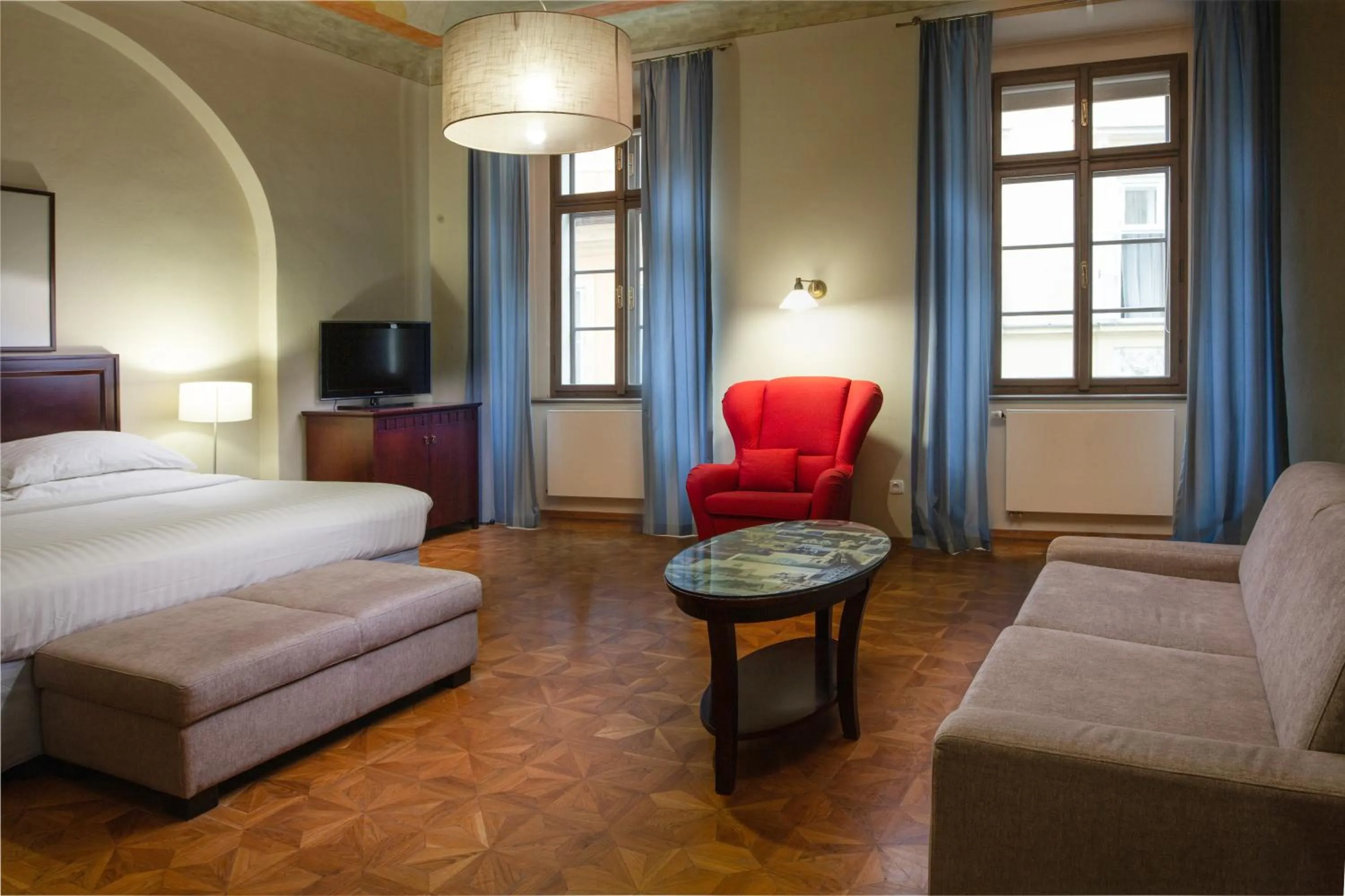 Bed in Charles Bridge Rooms & Suites by SIVEK HOTELS