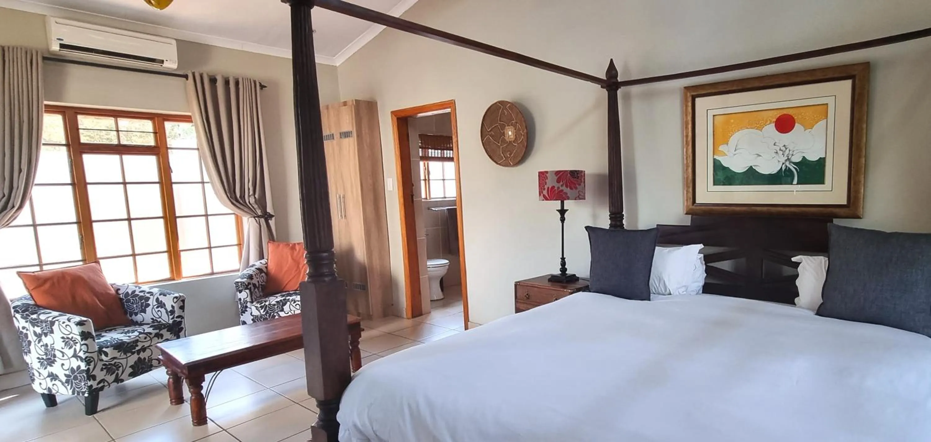 Photo of the whole room, Bed in African Roots Guest House