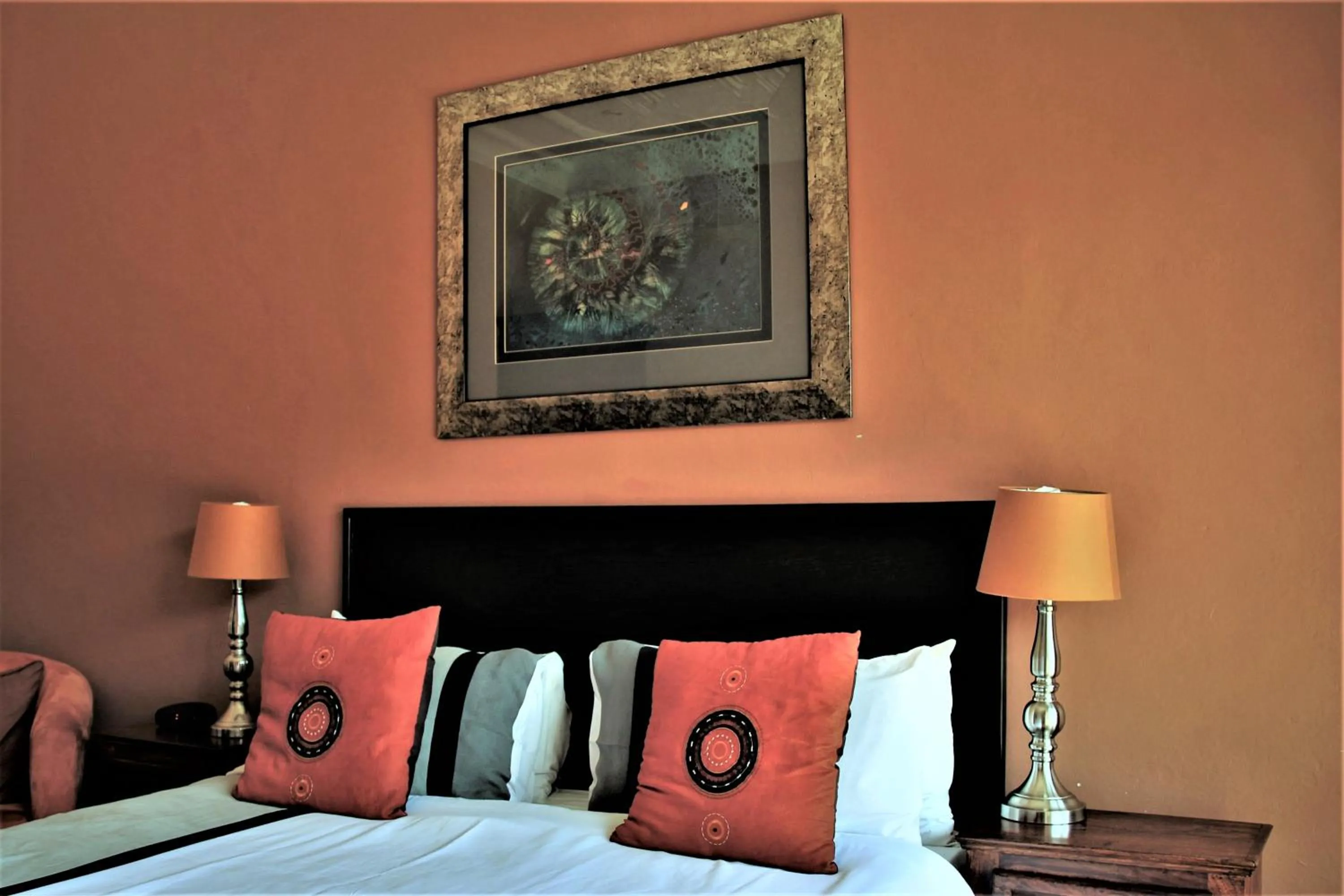 Decorative detail, Bed in African Roots Guest House