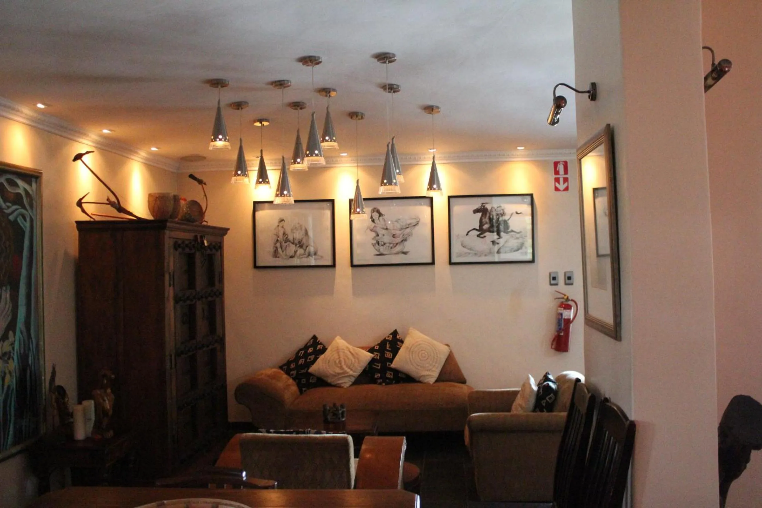 Lounge or bar in African Roots Guest House