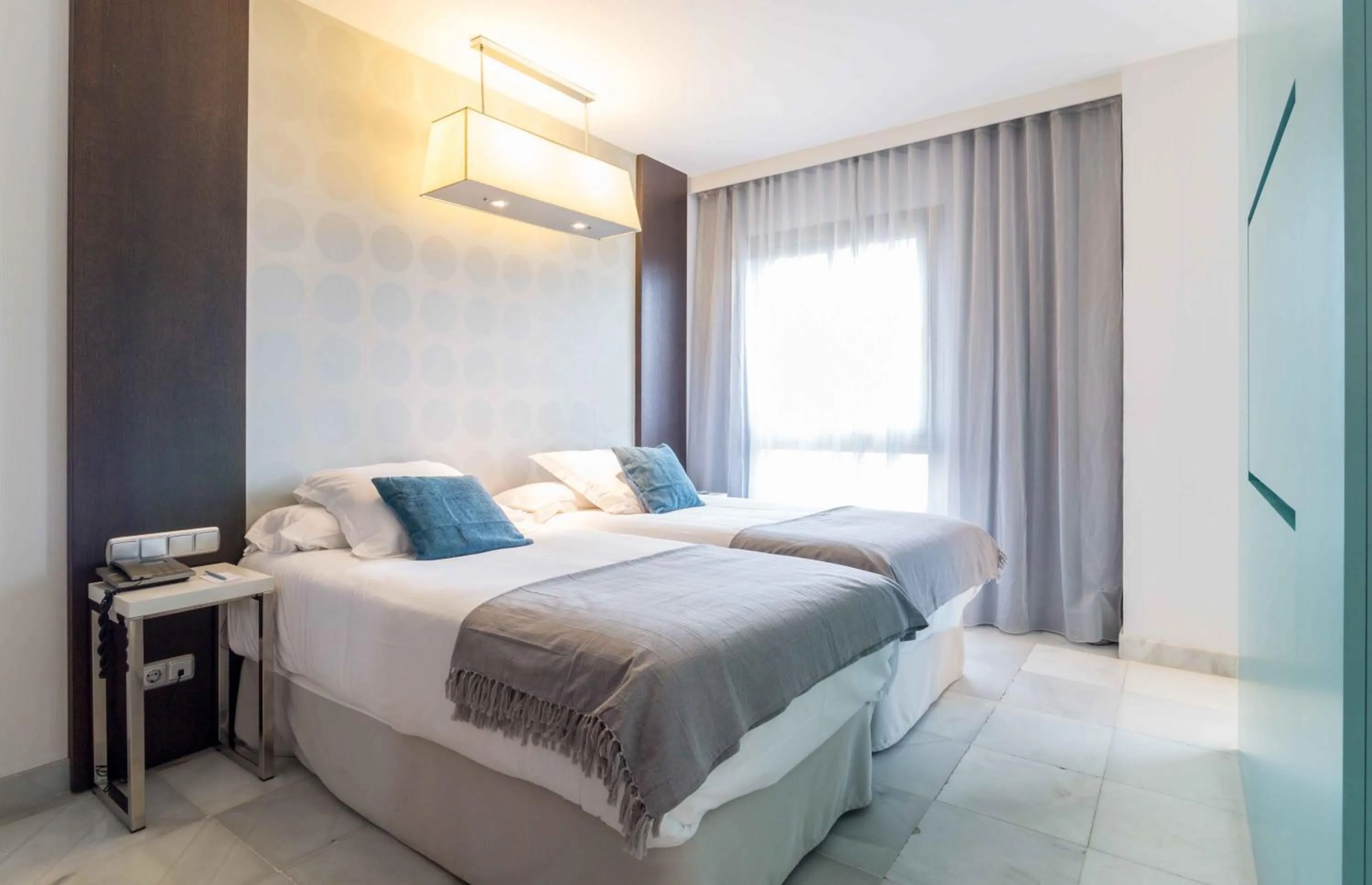 Bed in Suittes Hotel