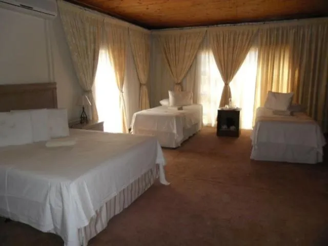 Photo of the whole room, Bed in Legae La Tshepo