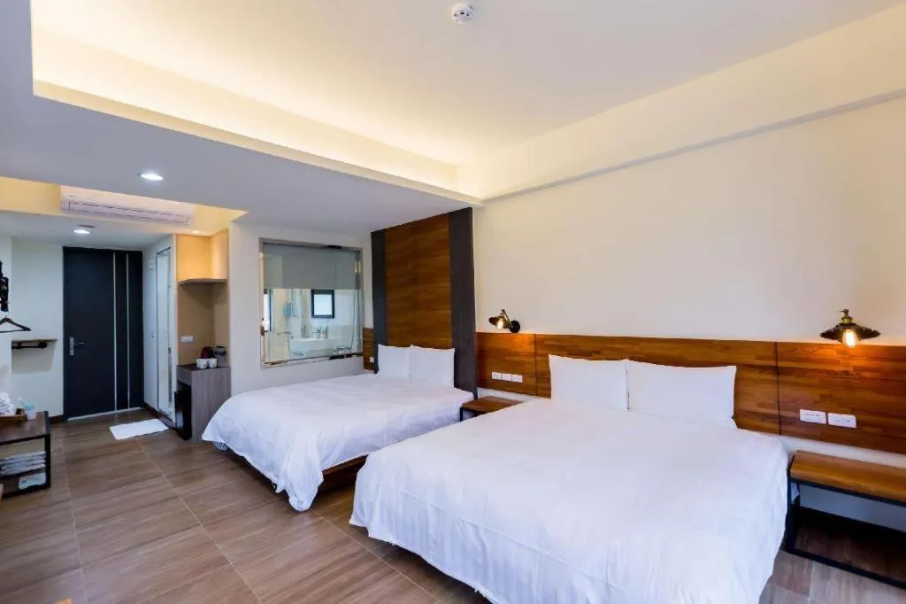 Bed in Rich Sunshine Inn