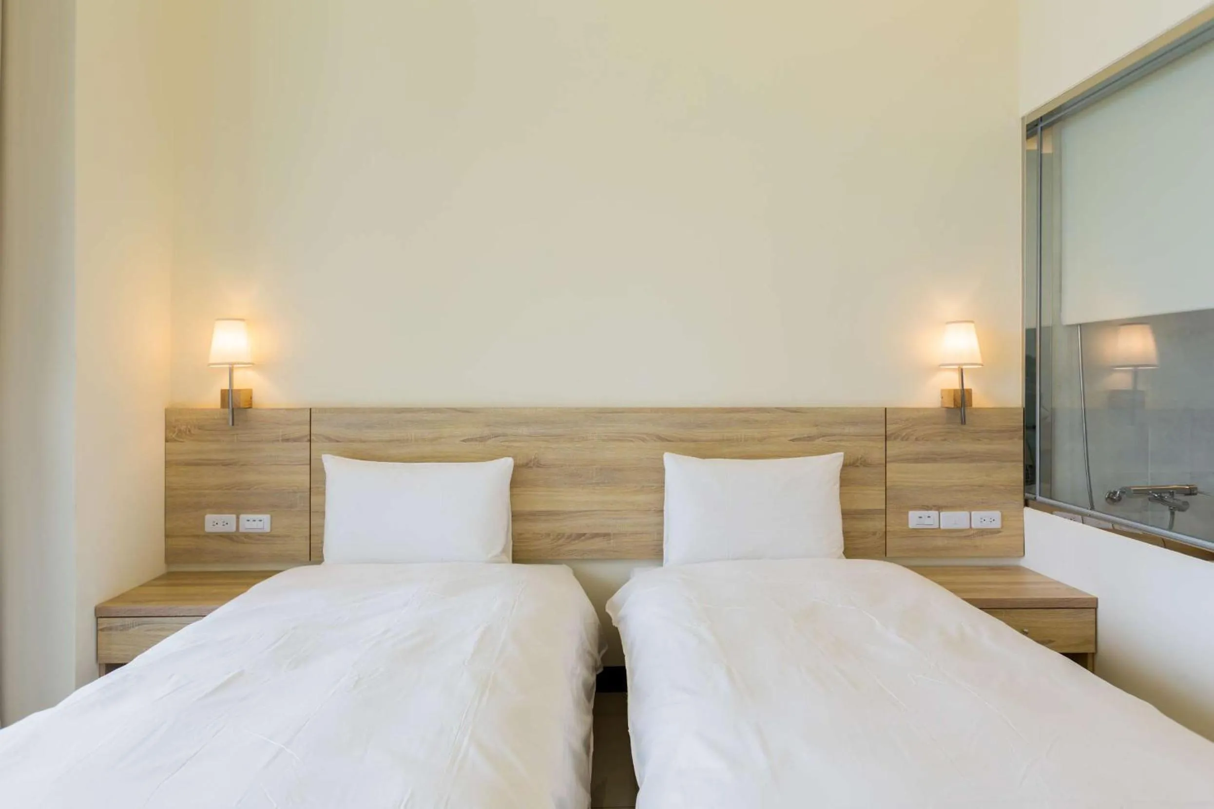 Bed in Rich Sunshine Inn