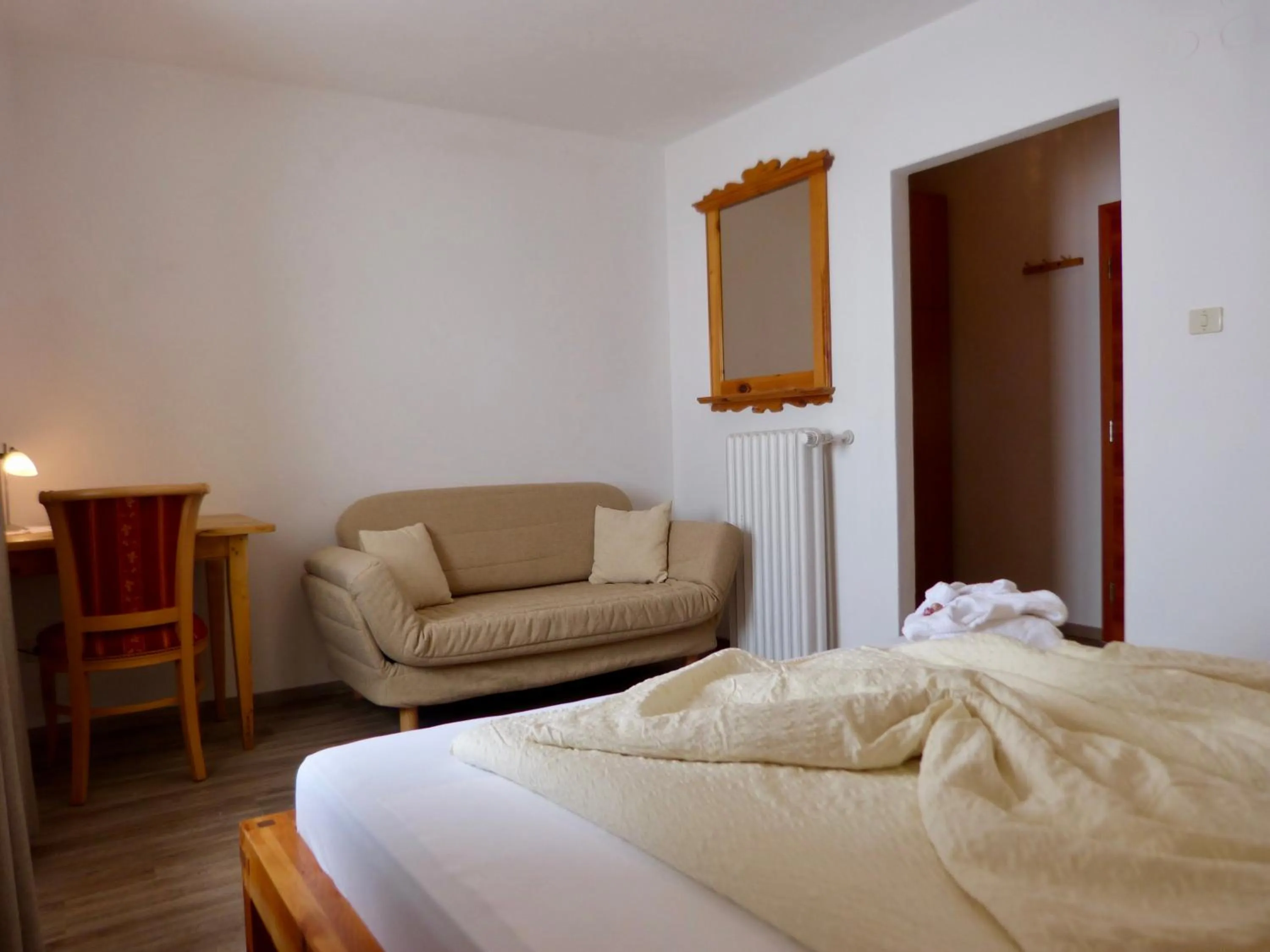 Seating area, Bed in Berghotel Franzenshöhe