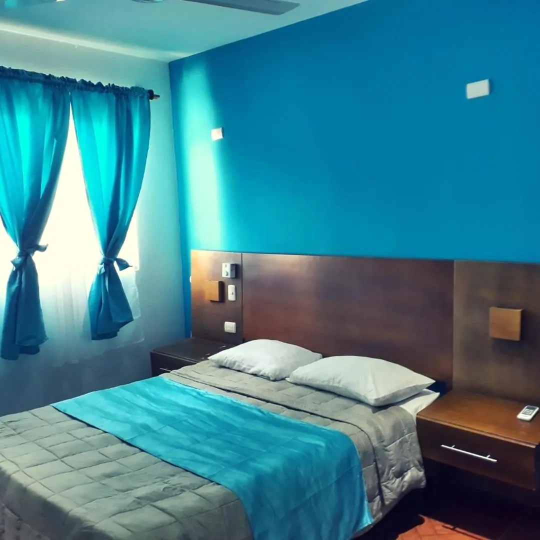 Bed in Figaro Hotel Samana