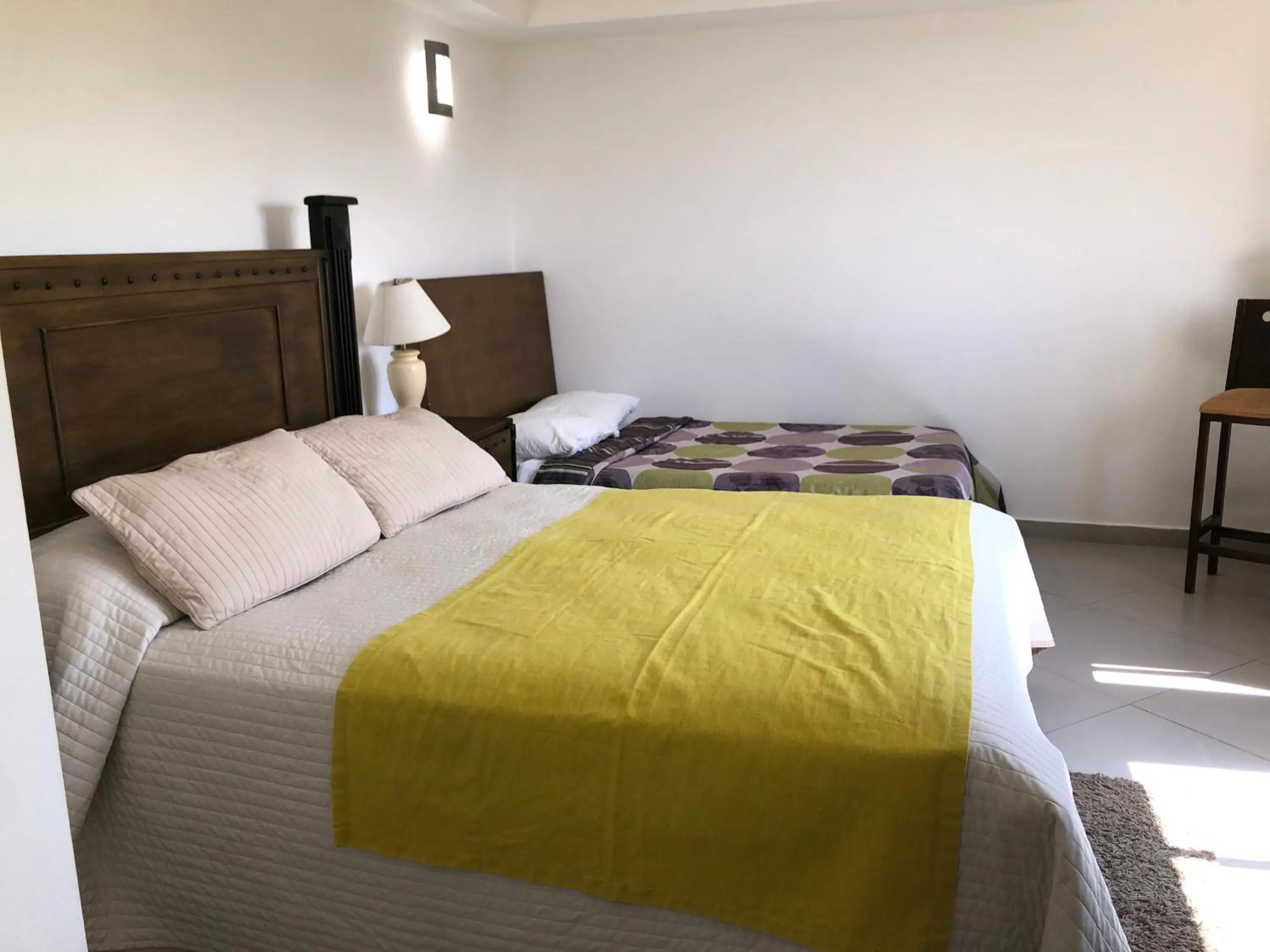 Bed in Figaro Hotel Samana