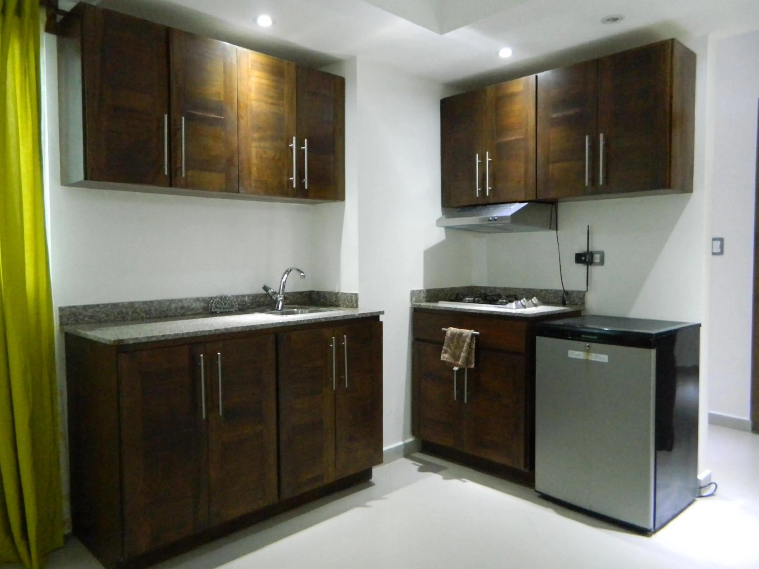 Kitchen or kitchenette in Figaro Hotel Samana