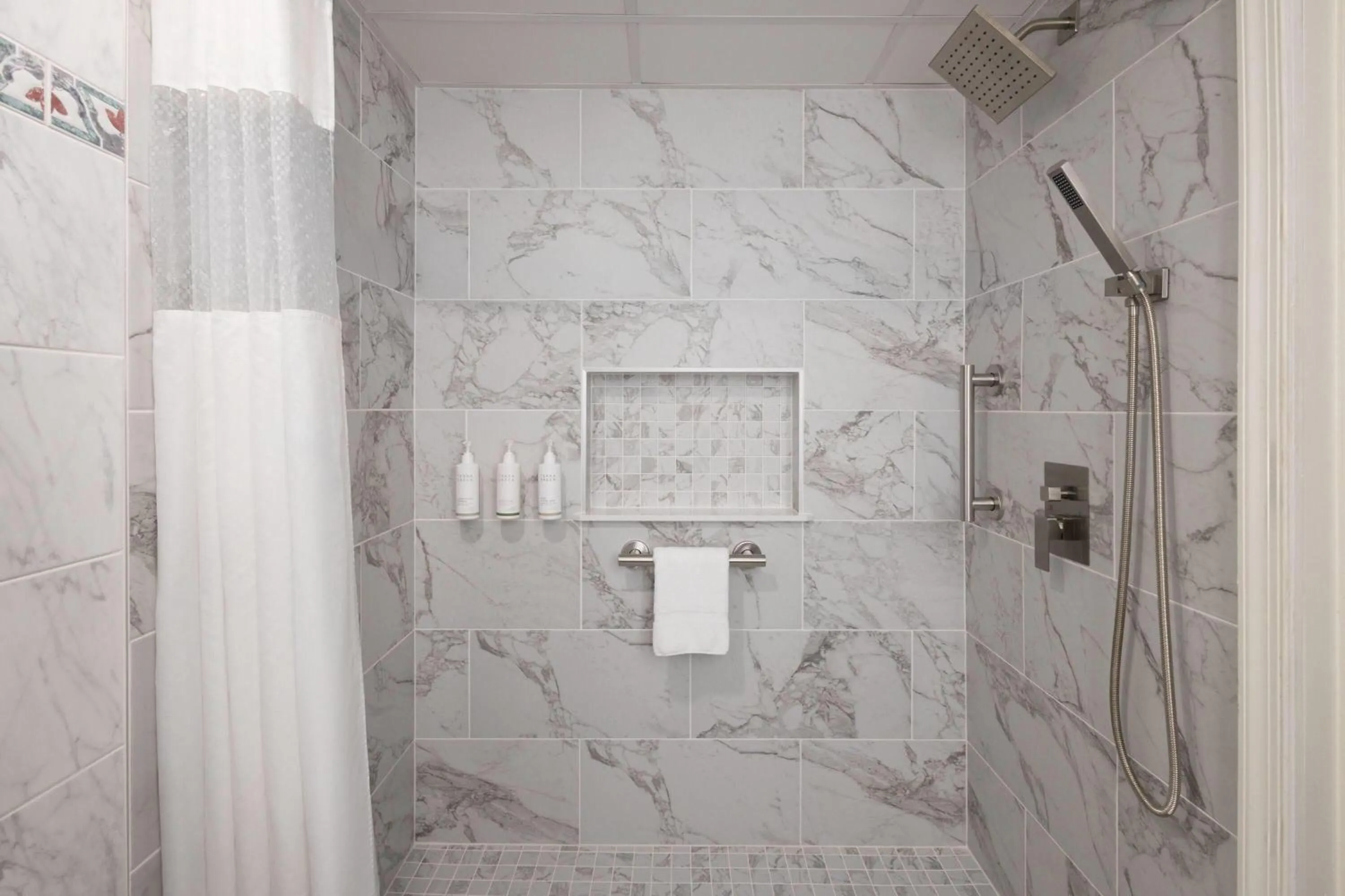 Shower in Howard Johnson Plaza by Wyndham Ocean City Oceanfront