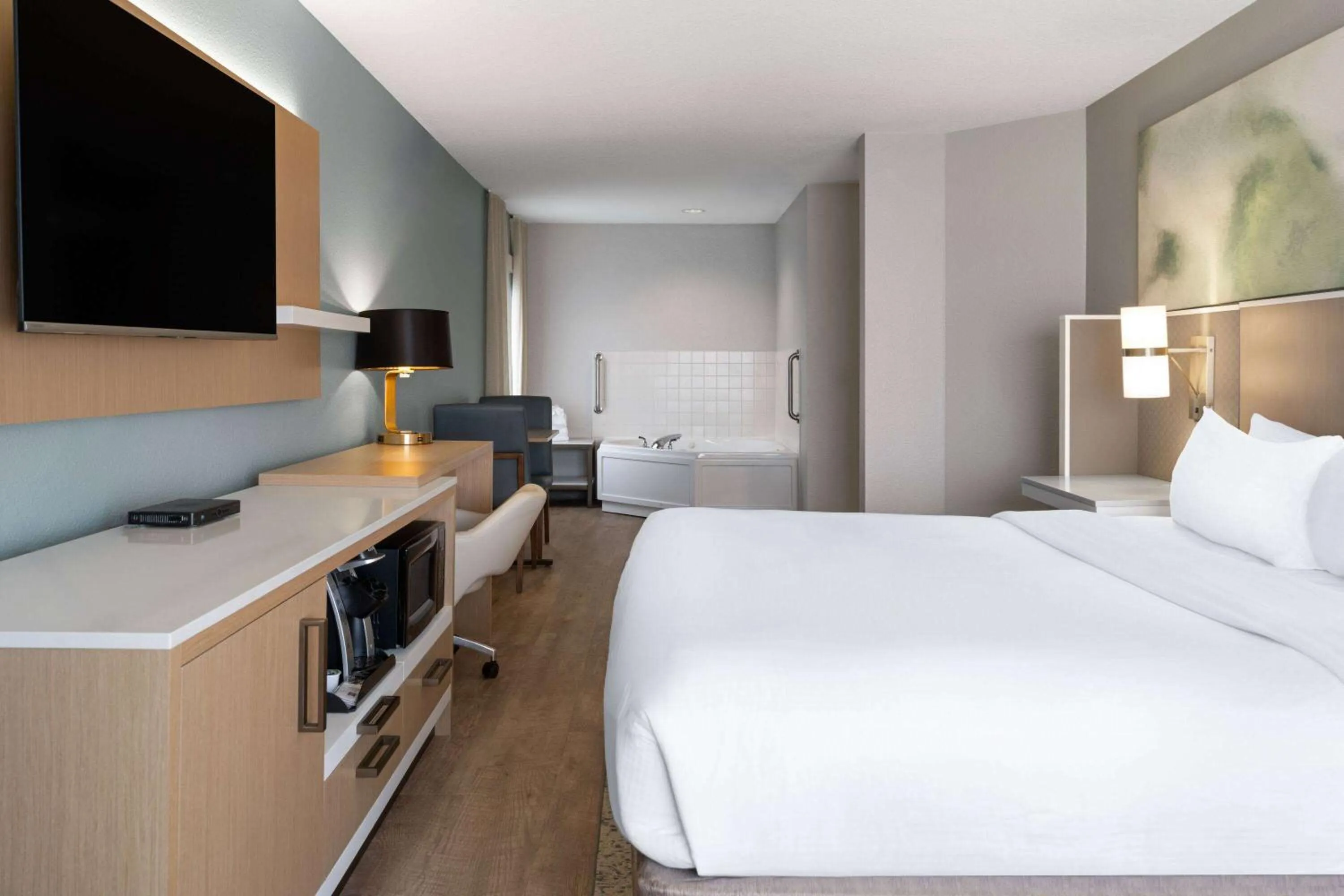 Photo of the whole room, Bed in Wyndham Garden Otsego-Minneapolis