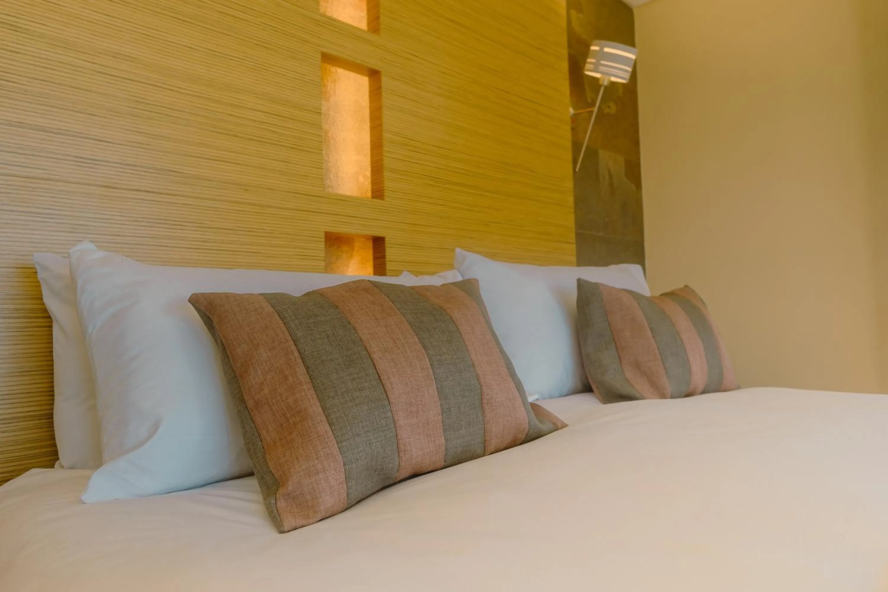 Bed in Rayentray Grand Hotel