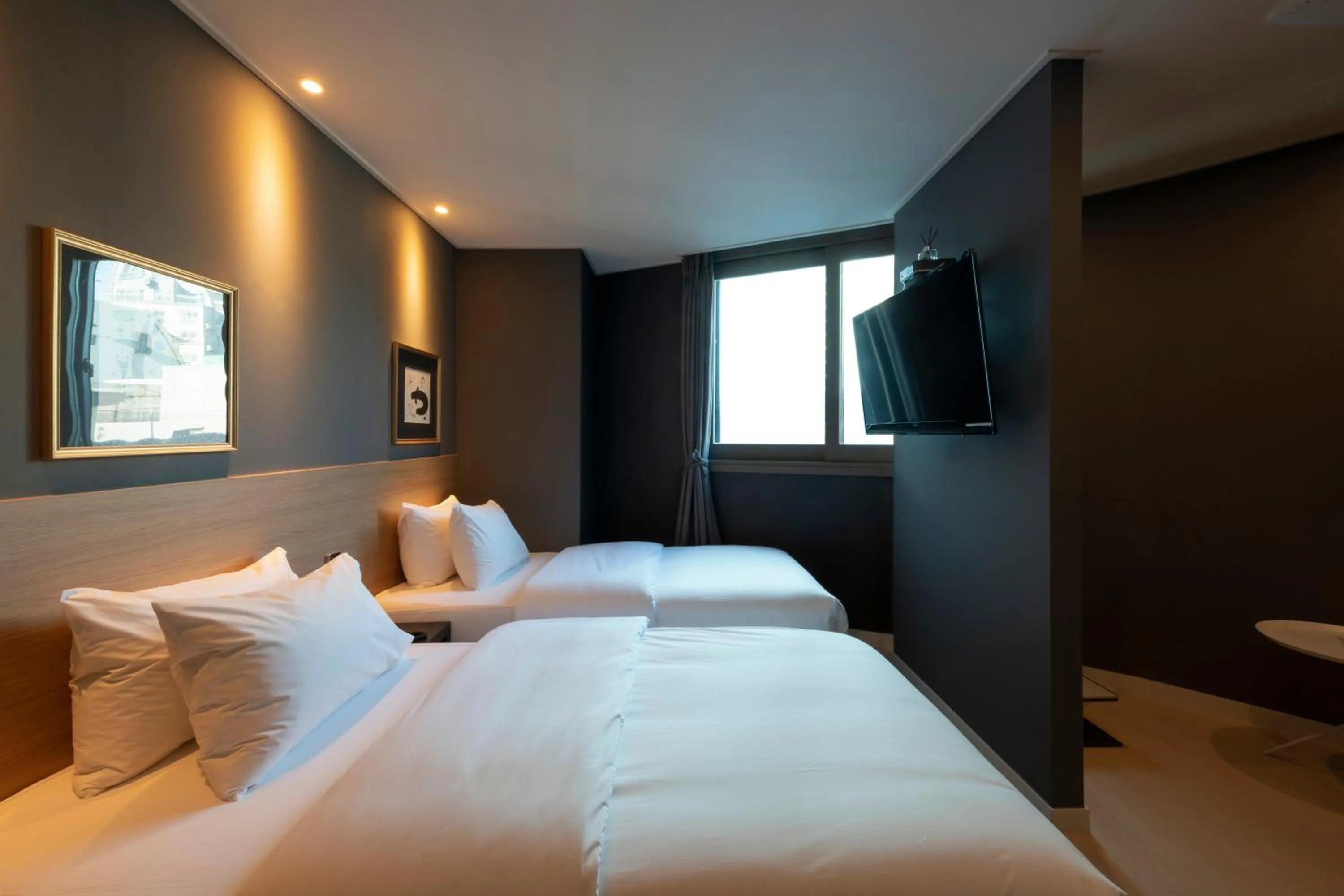 Bed in No. 25 Signature Hotel Daecheong