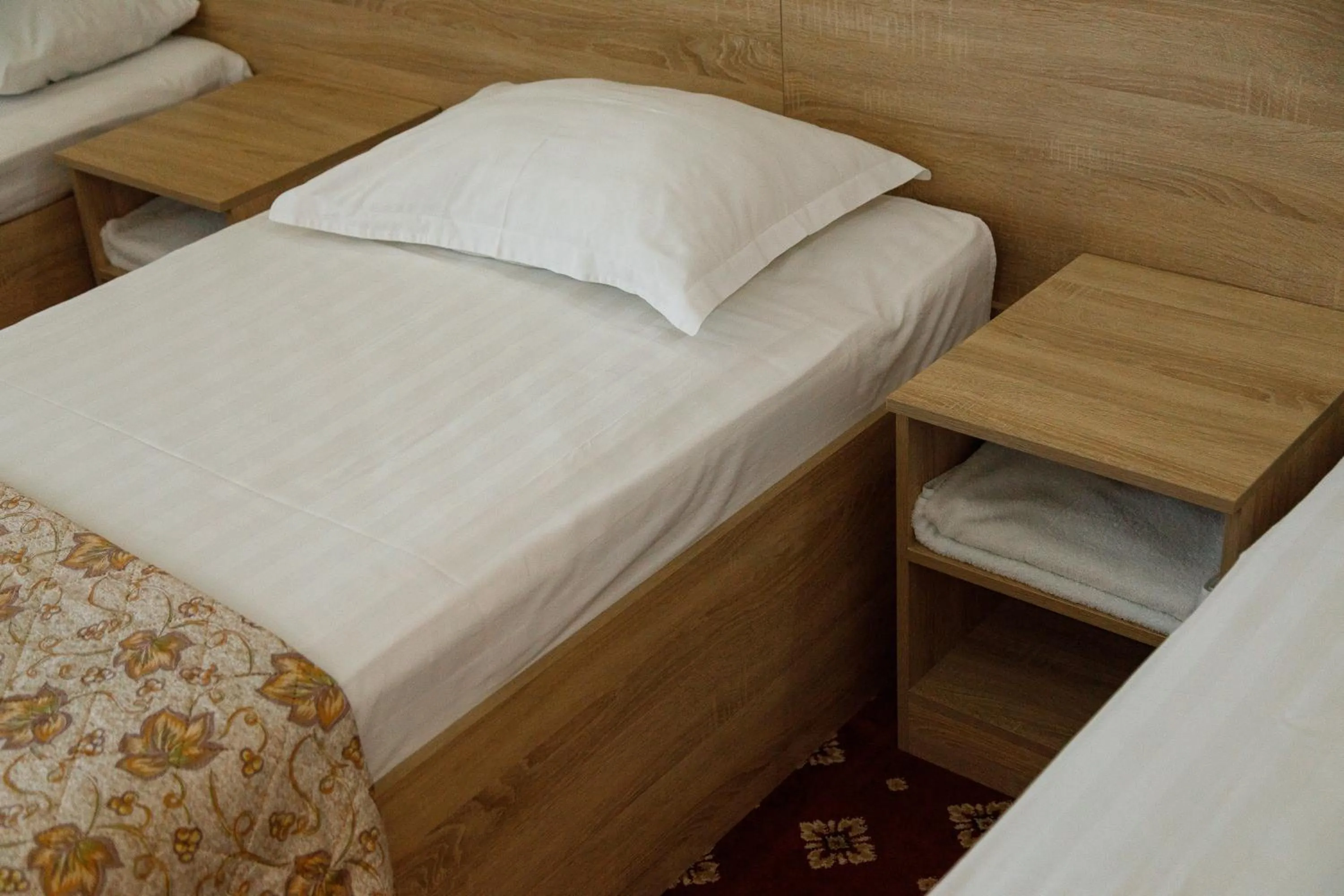 Bed in Silk Way Hotel