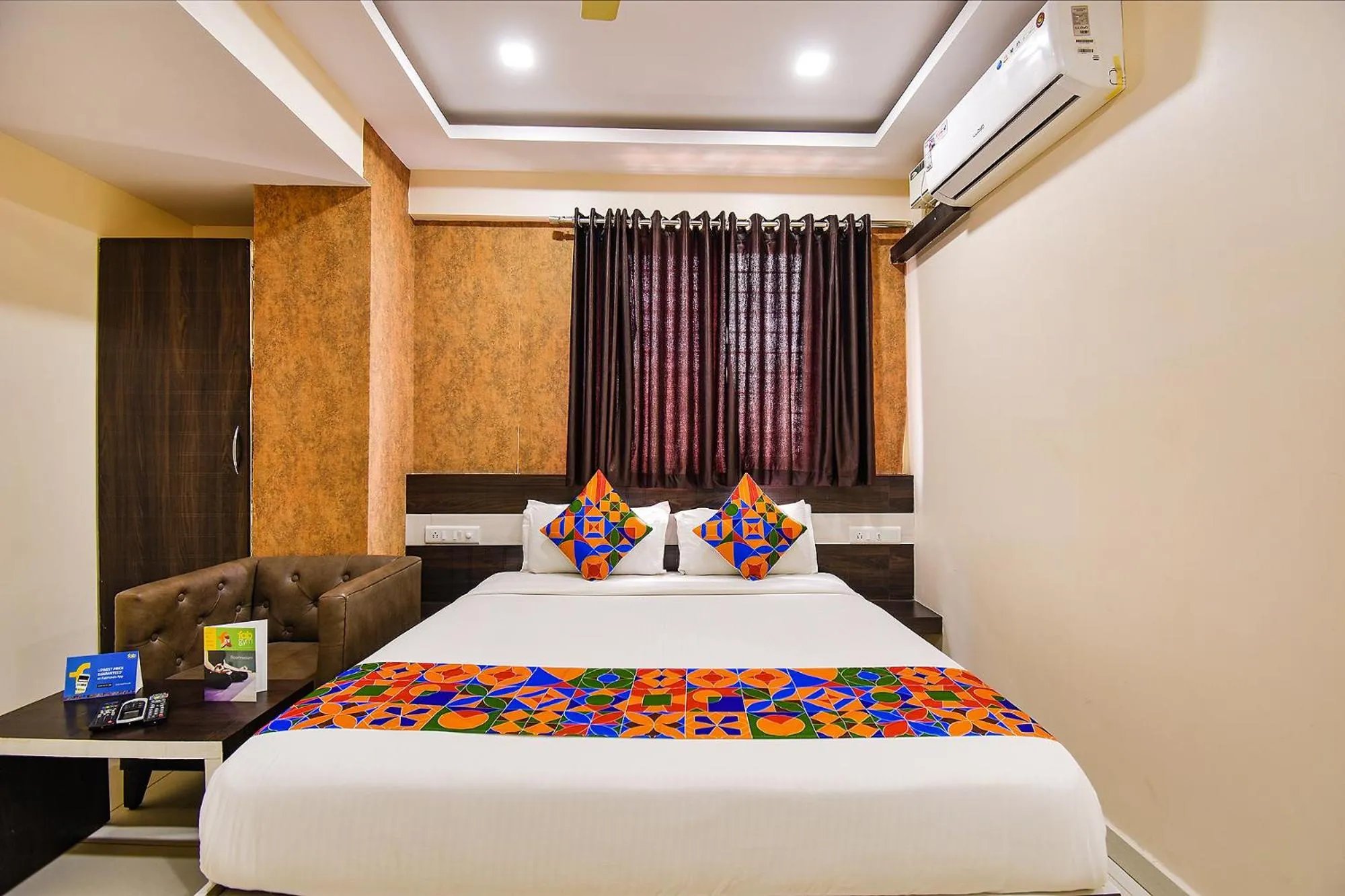 Bed in FabHotel Rotano Suites - Yelahanka