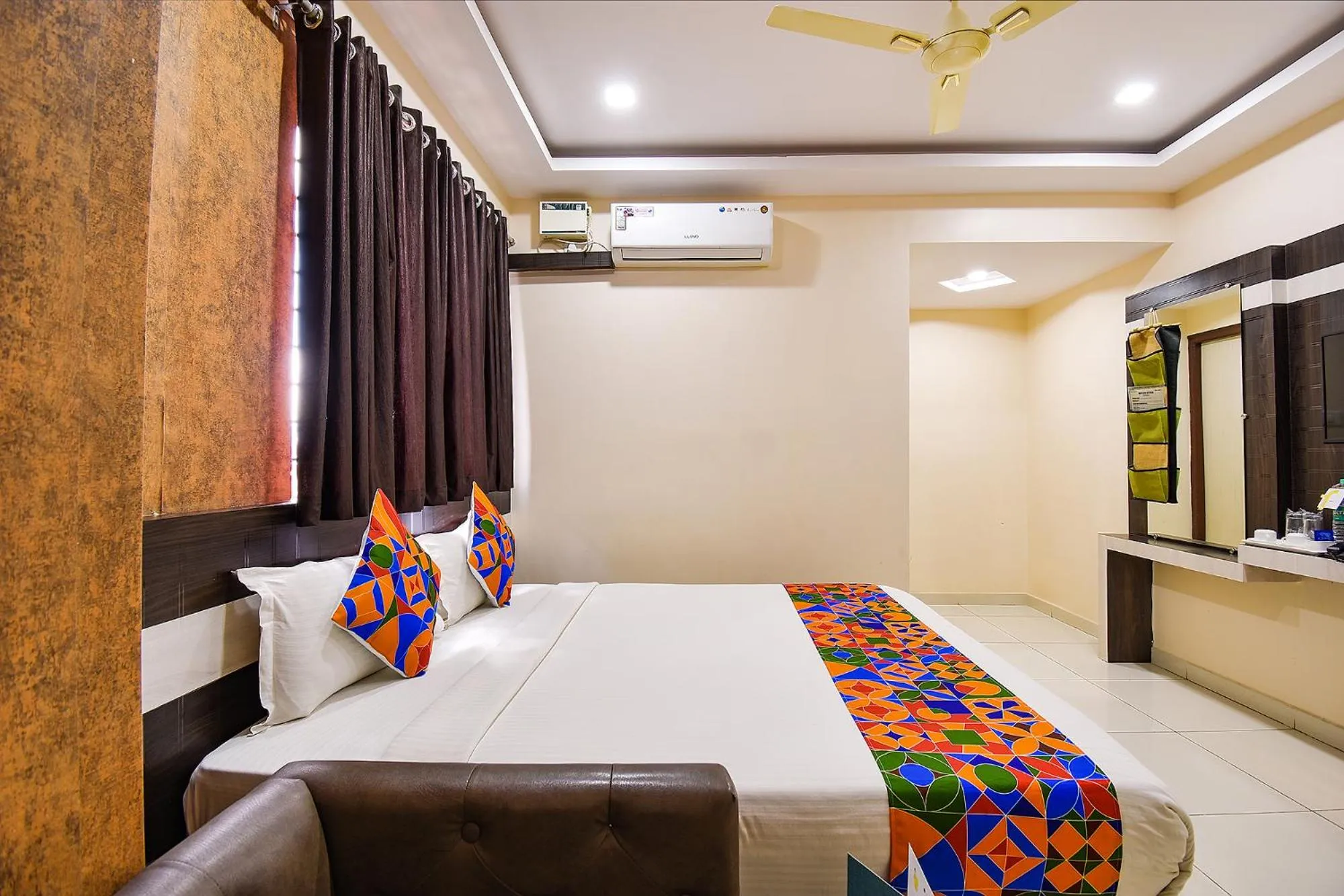 Bed in FabHotel Rotano Suites - Yelahanka