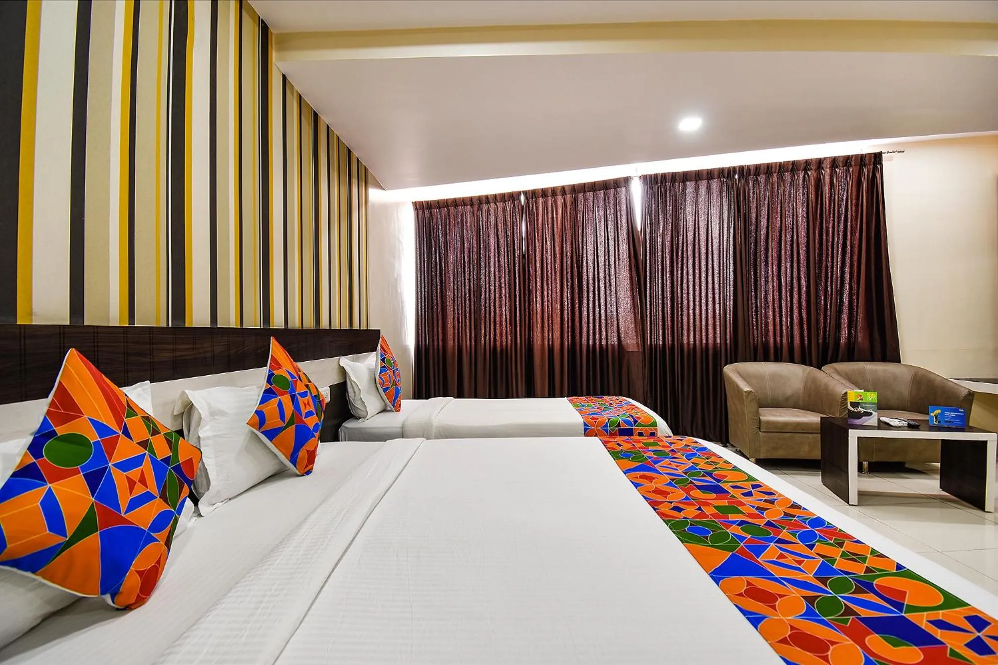 Bed in FabHotel Rotano Suites - Yelahanka