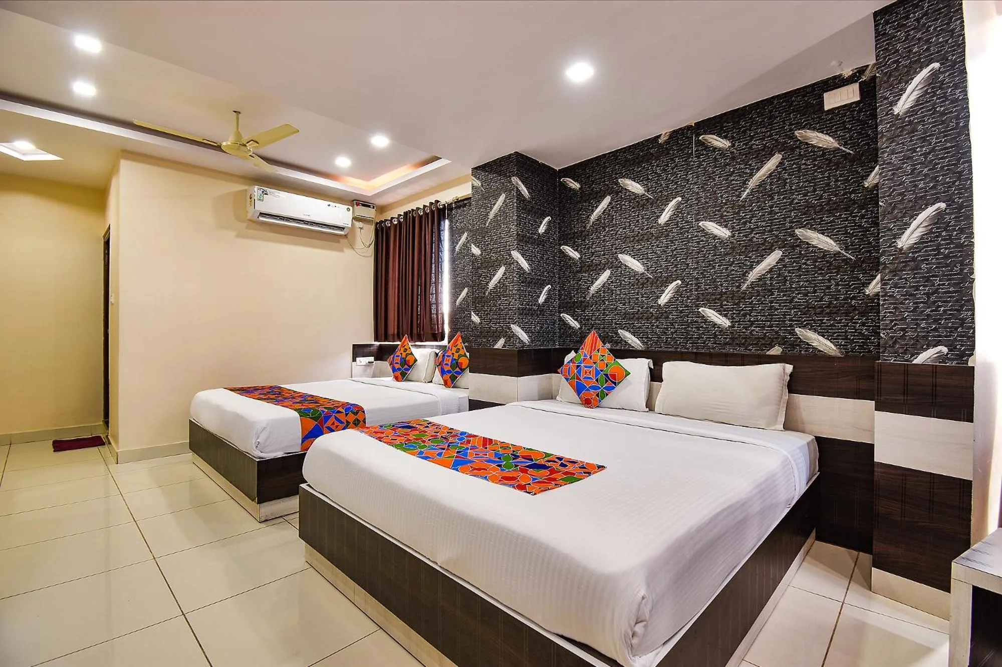 Bed in FabHotel Rotano Suites - Yelahanka