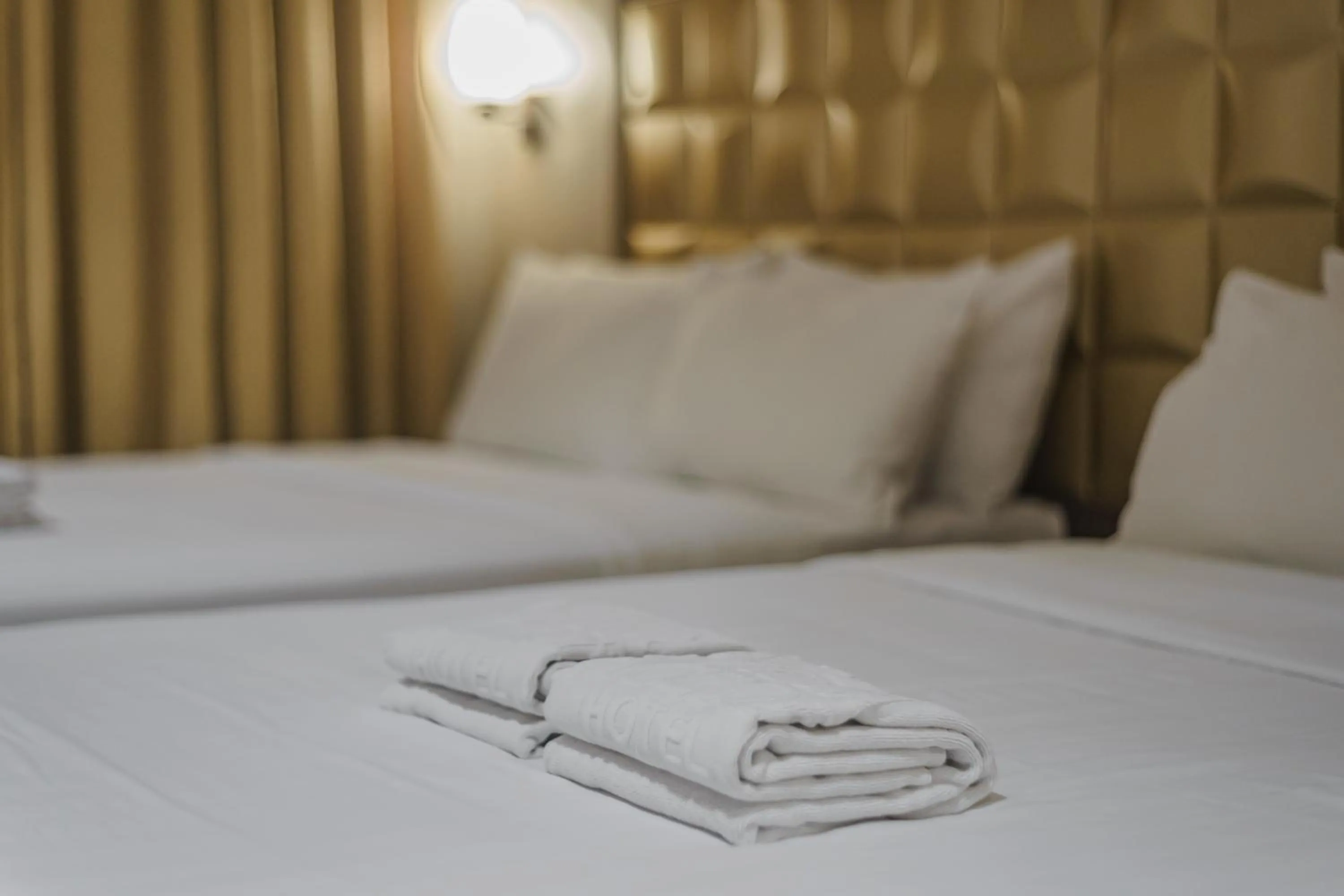 Bed in Robertson Hotel