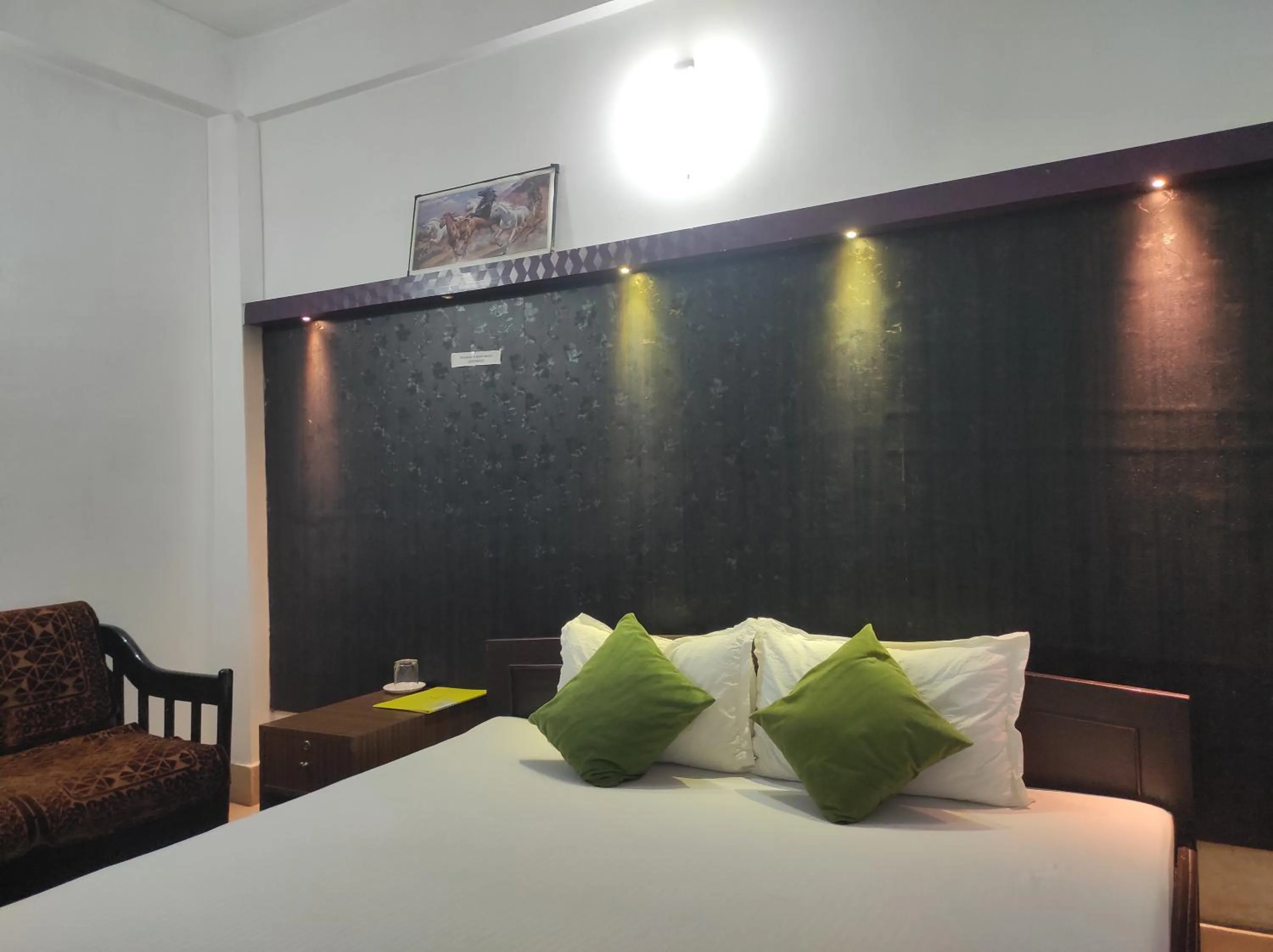 Bed in Hotel Indira