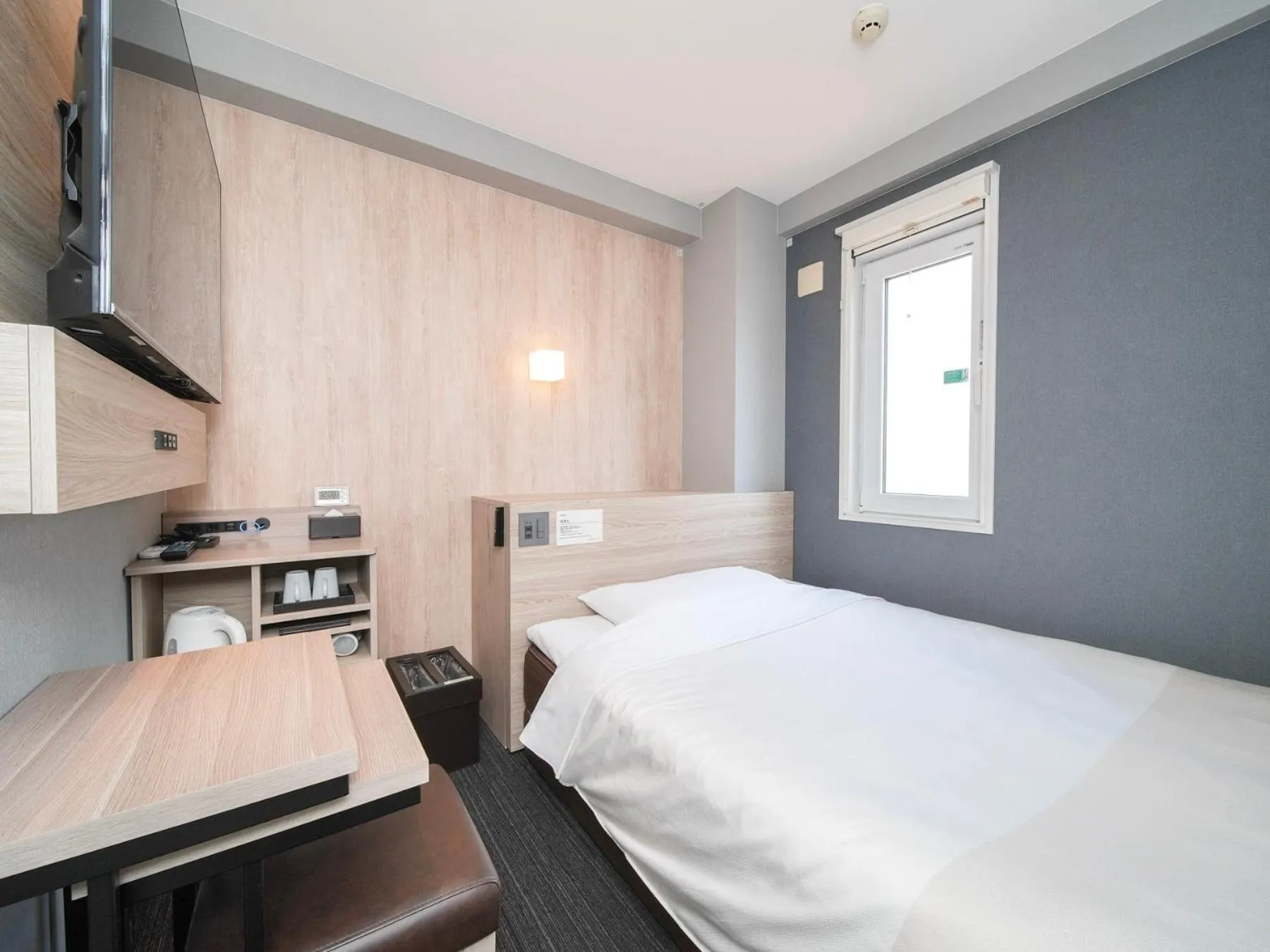 Bed in Super Hotel Hiroshima