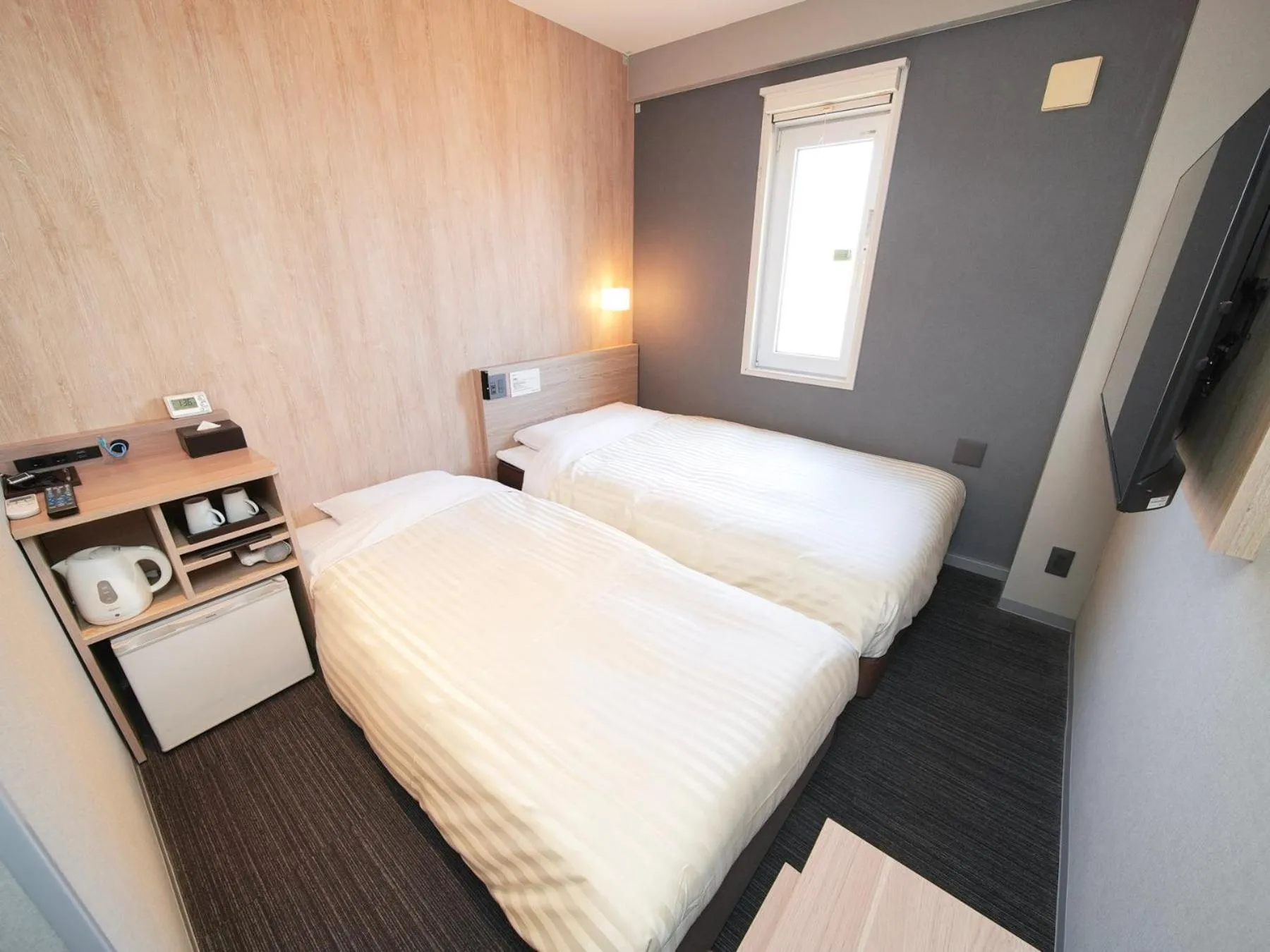 Bed in Super Hotel Hiroshima