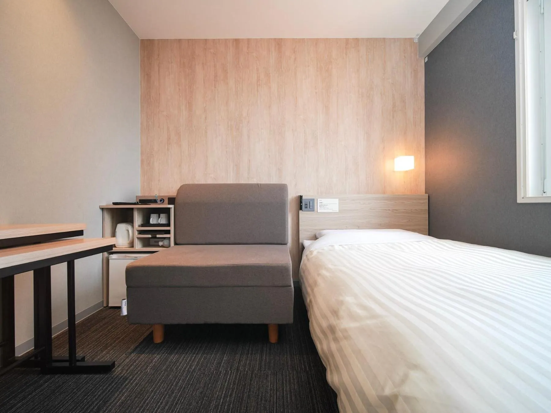 Bed in Super Hotel Hiroshima