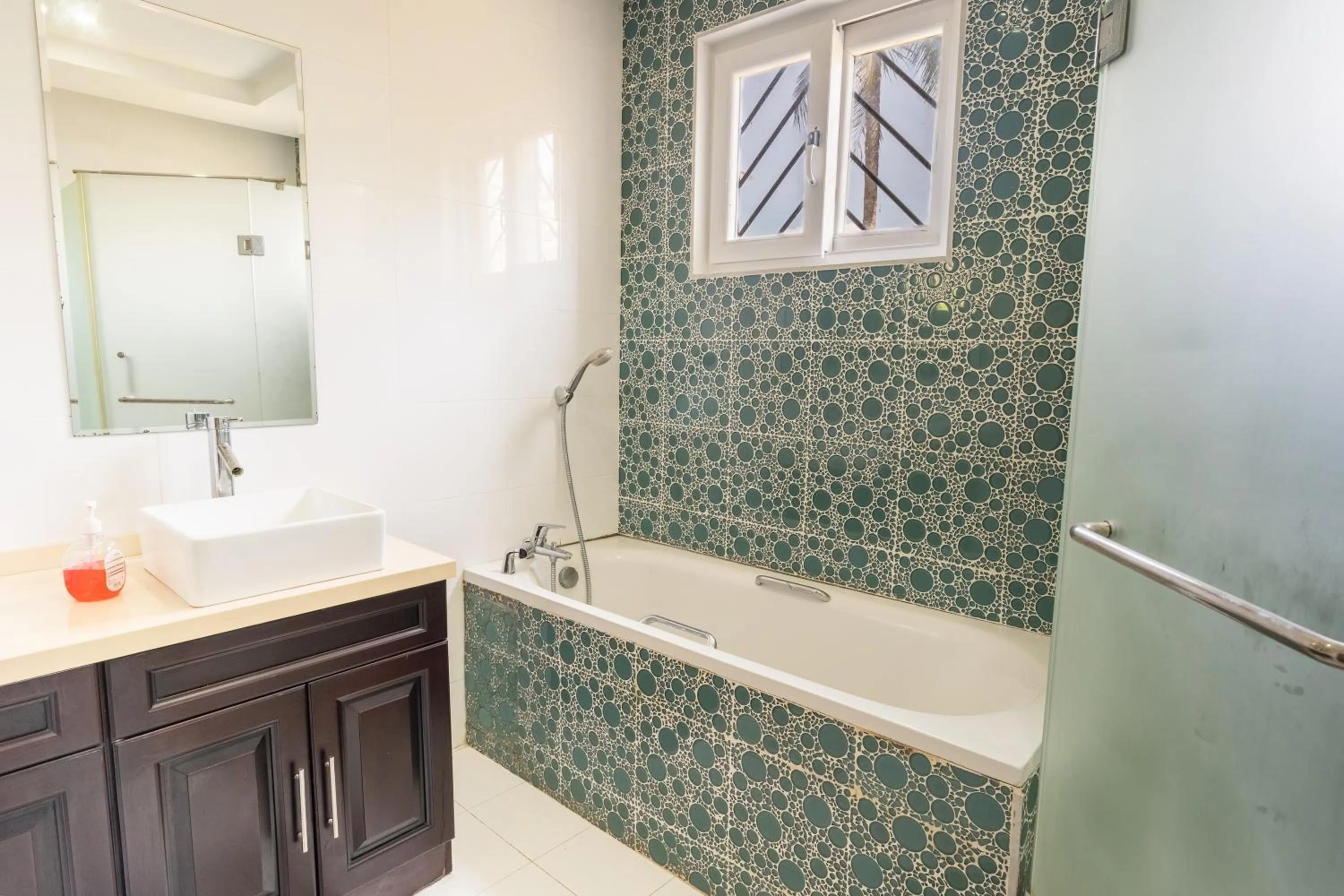 Bathroom in Queens Chateau Boutique Villa