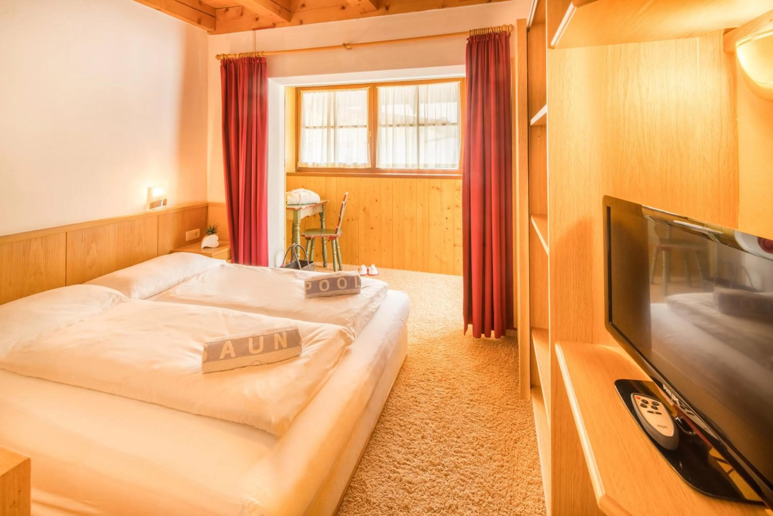 Bed in Piccolo Hotel Gurschler