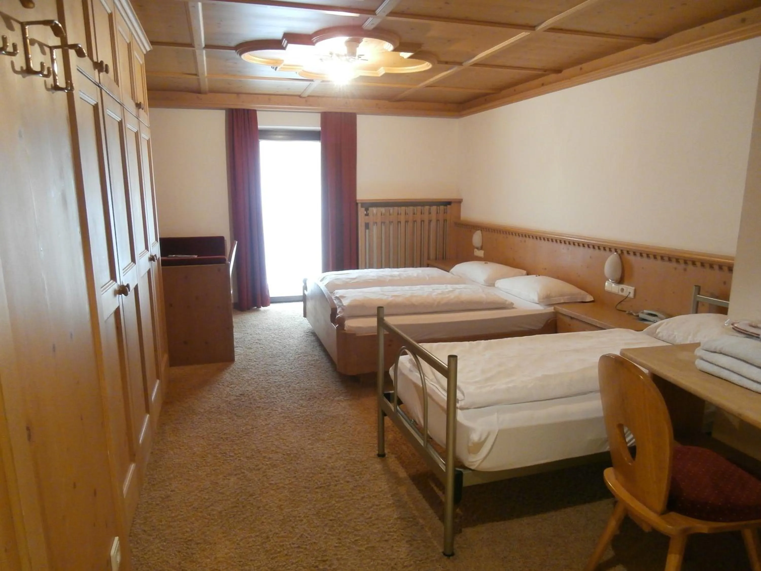 Bed in Piccolo Hotel Gurschler