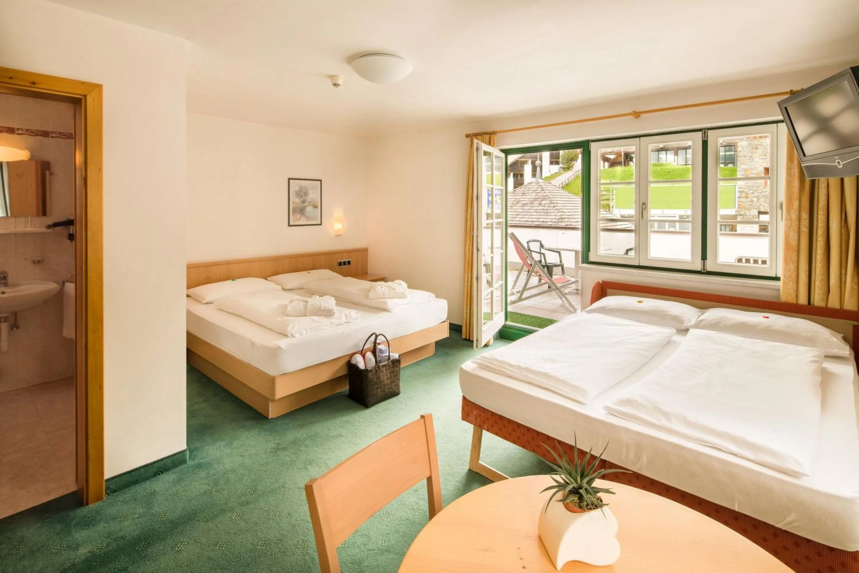 Bed in Piccolo Hotel Gurschler