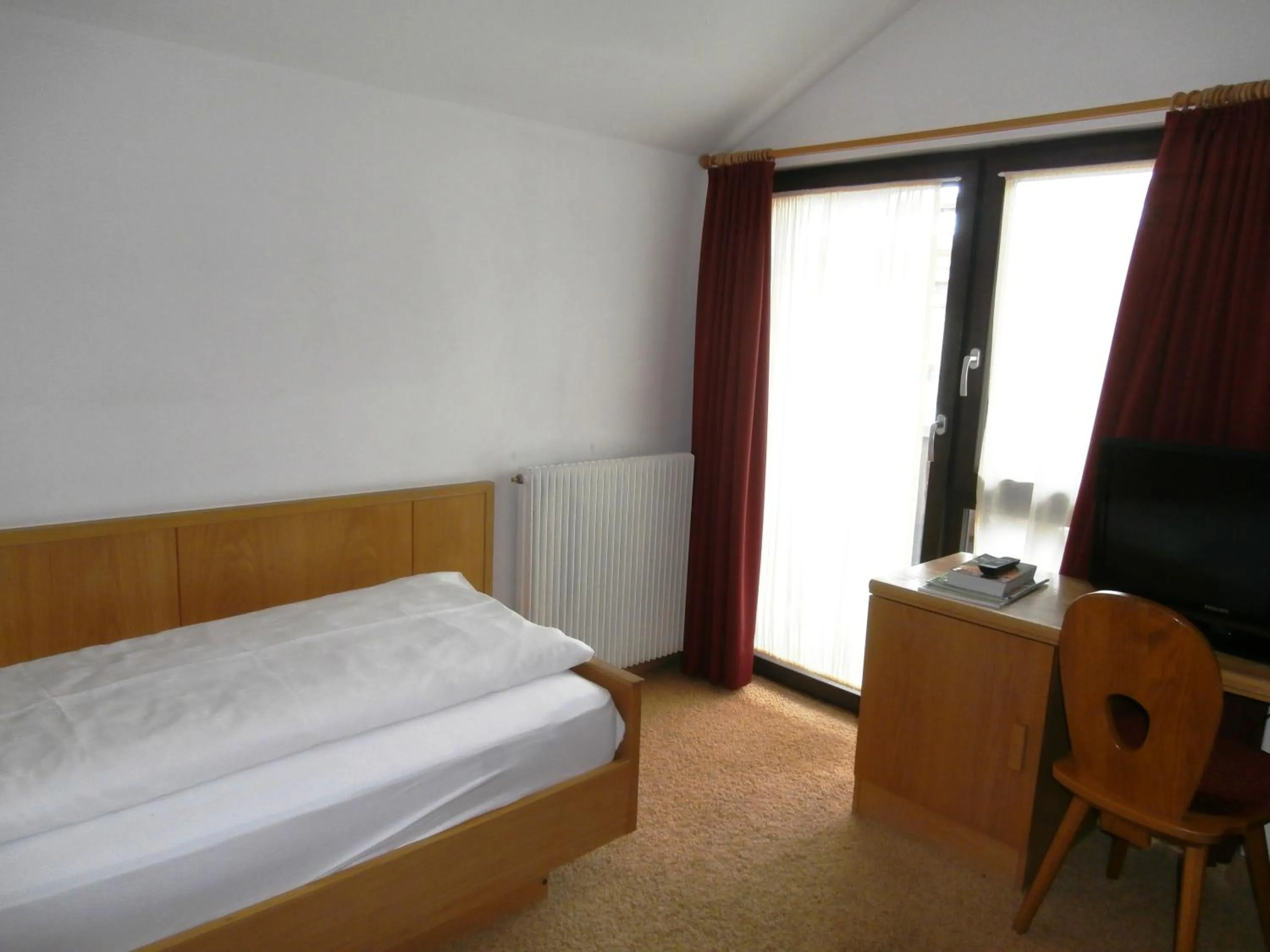 Bed in Piccolo Hotel Gurschler