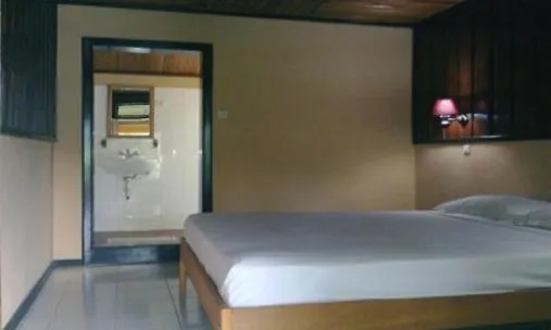 Bedroom in Ue Datu Cottages