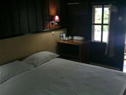 Bedroom in Ue Datu Cottages