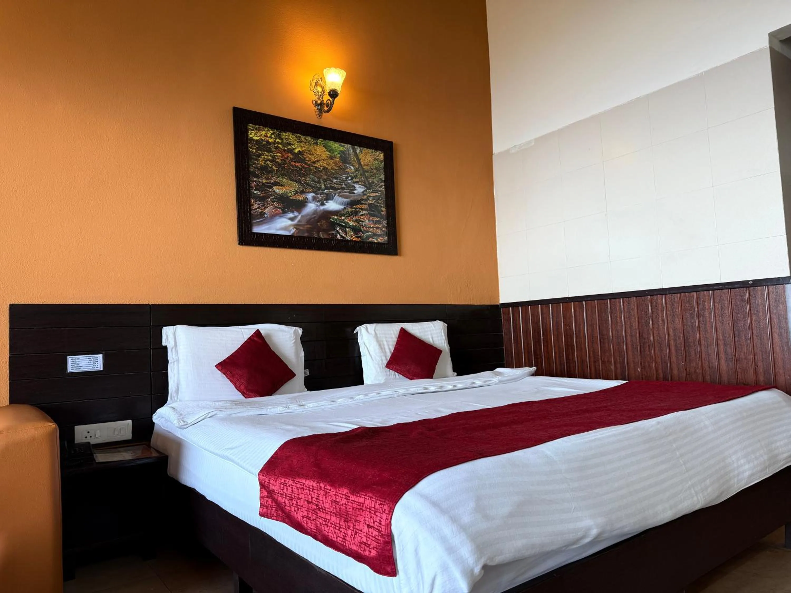 Bed in ECKO Kasang Regency Hill Resort