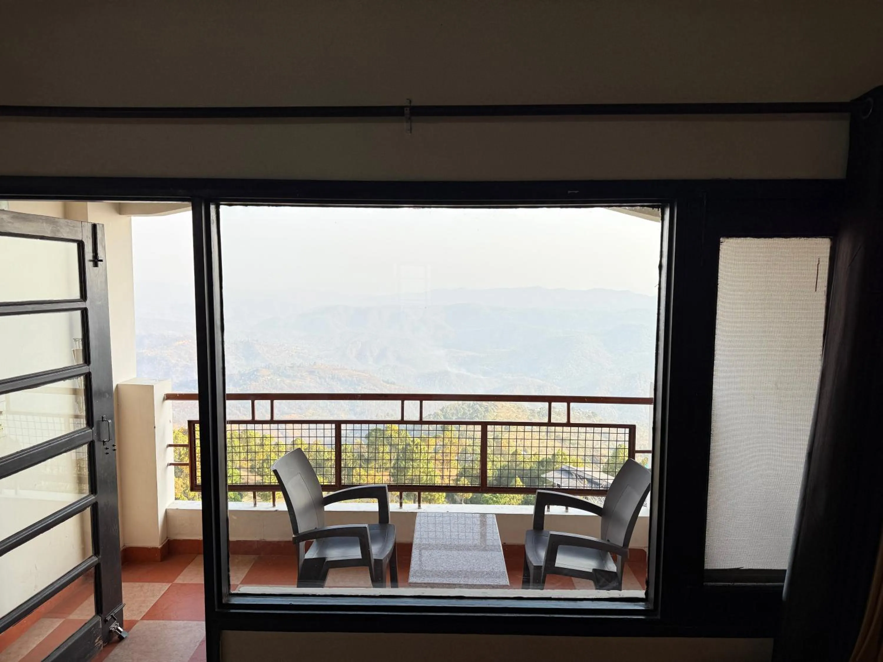 Seating area in ECKO Kasang Regency Hill Resort