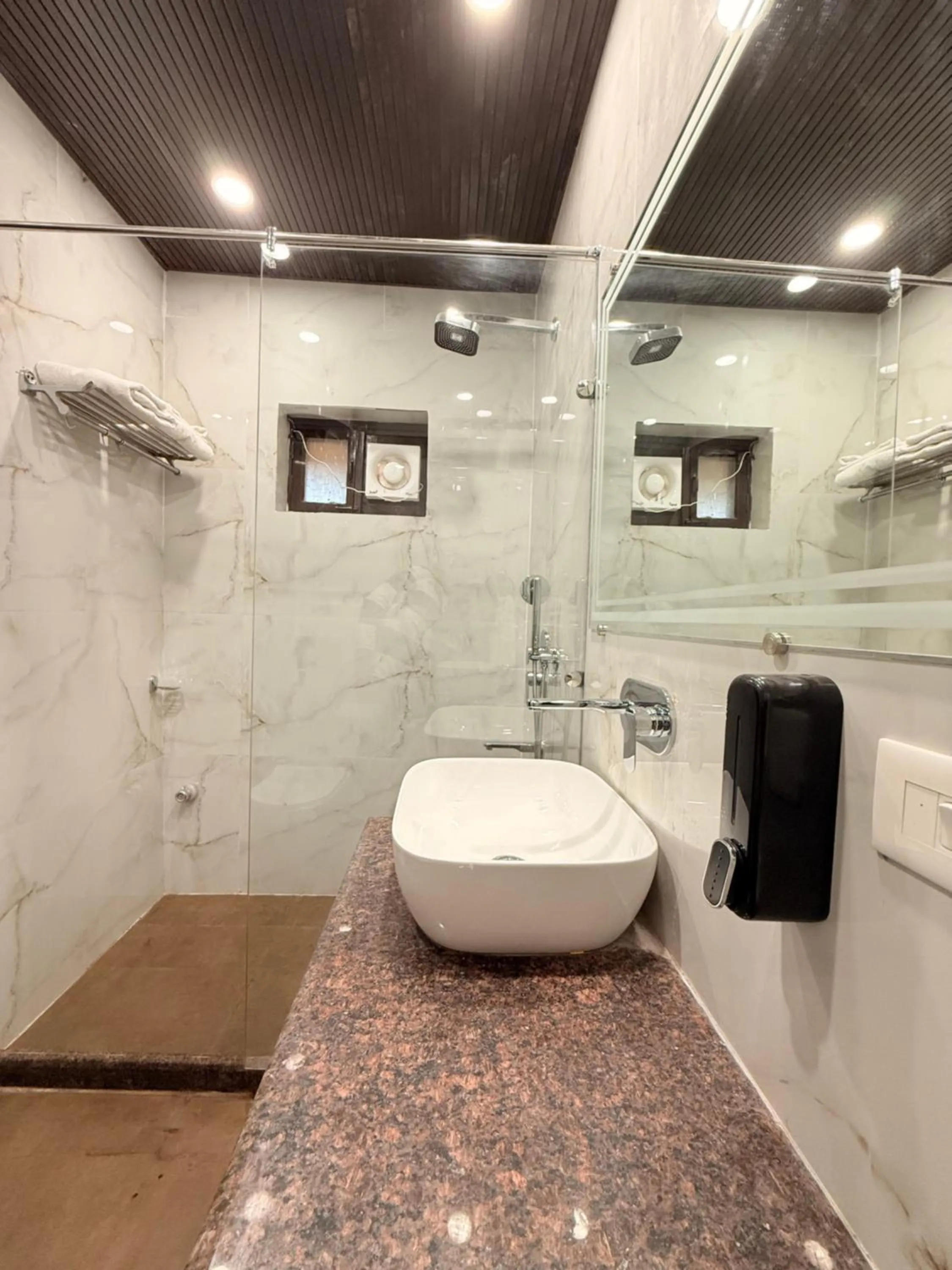 Shower in ECKO Kasang Regency Hill Resort