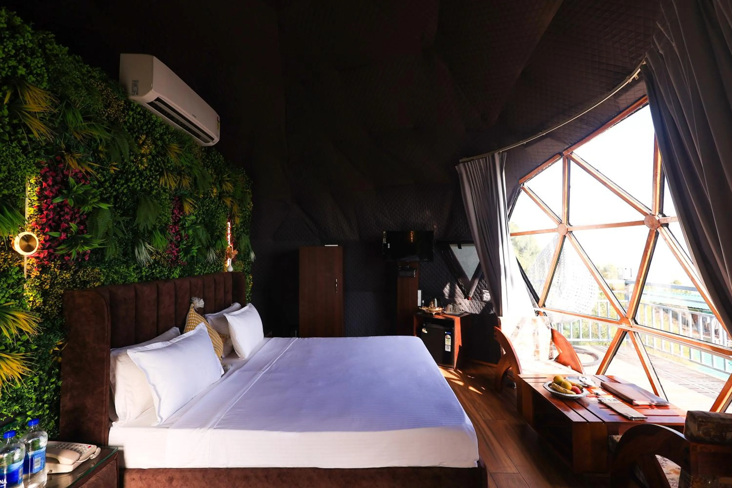 Photo of the whole room, Bed in ECKO Kasang Regency Hill Resort