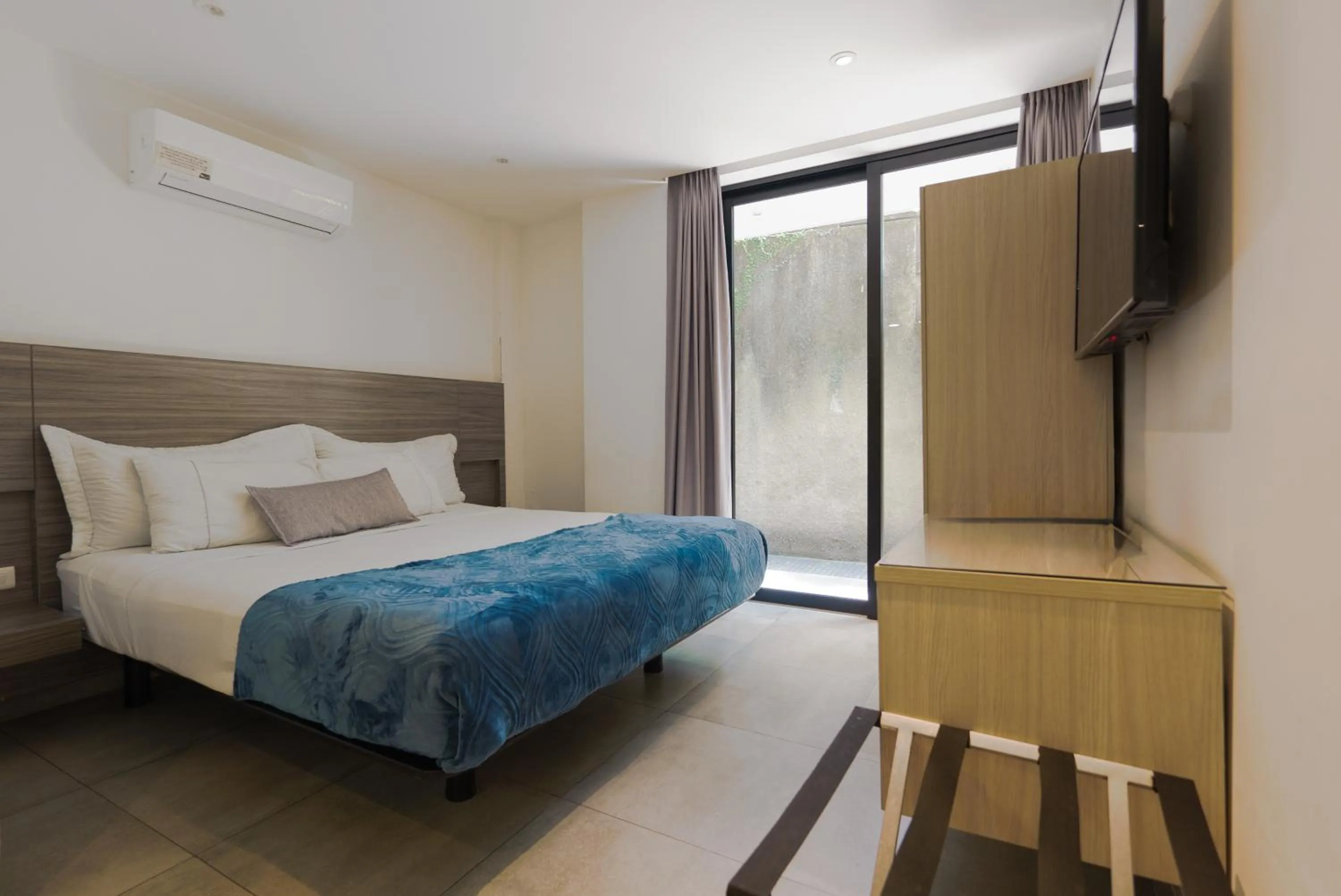 Bed in Antope - Apartaestudios